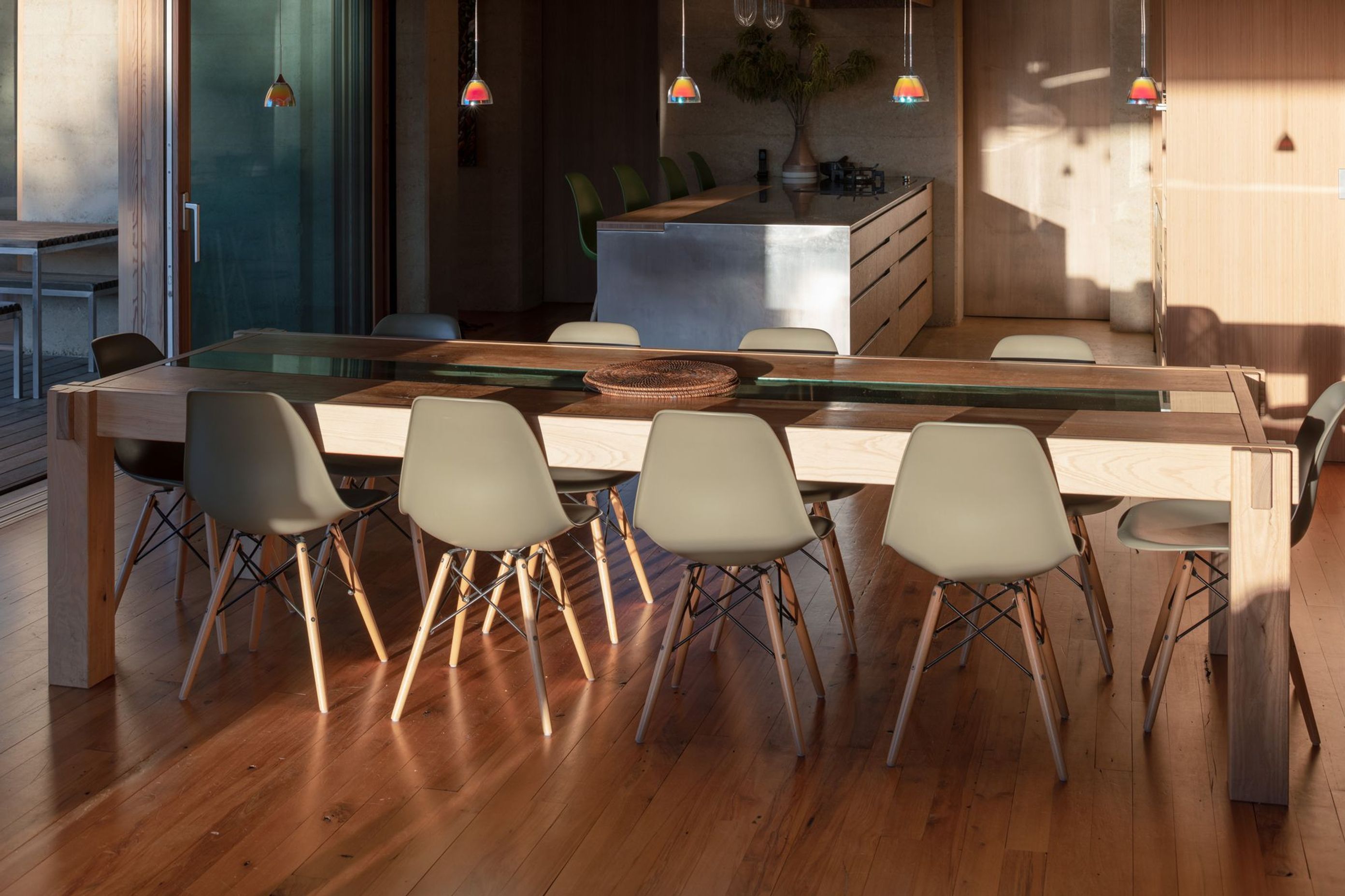 In keeping with the theme of sustainability, much of the furniture and fixtures were handmade by the homeowner, including the large dining table.