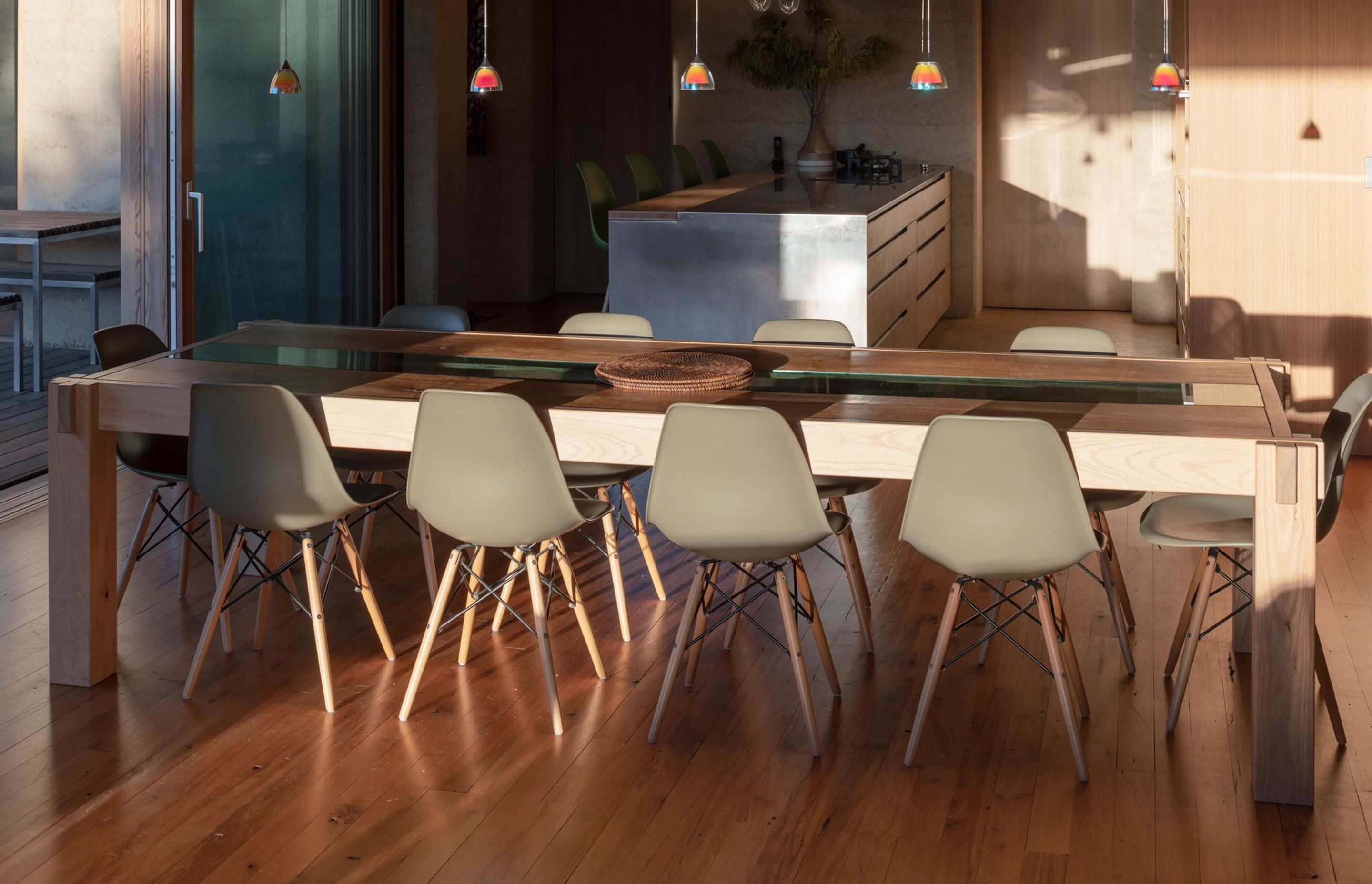 In keeping with the theme of sustainability, much of the furniture and fixtures were handmade by the homeowner, including the large dining table.