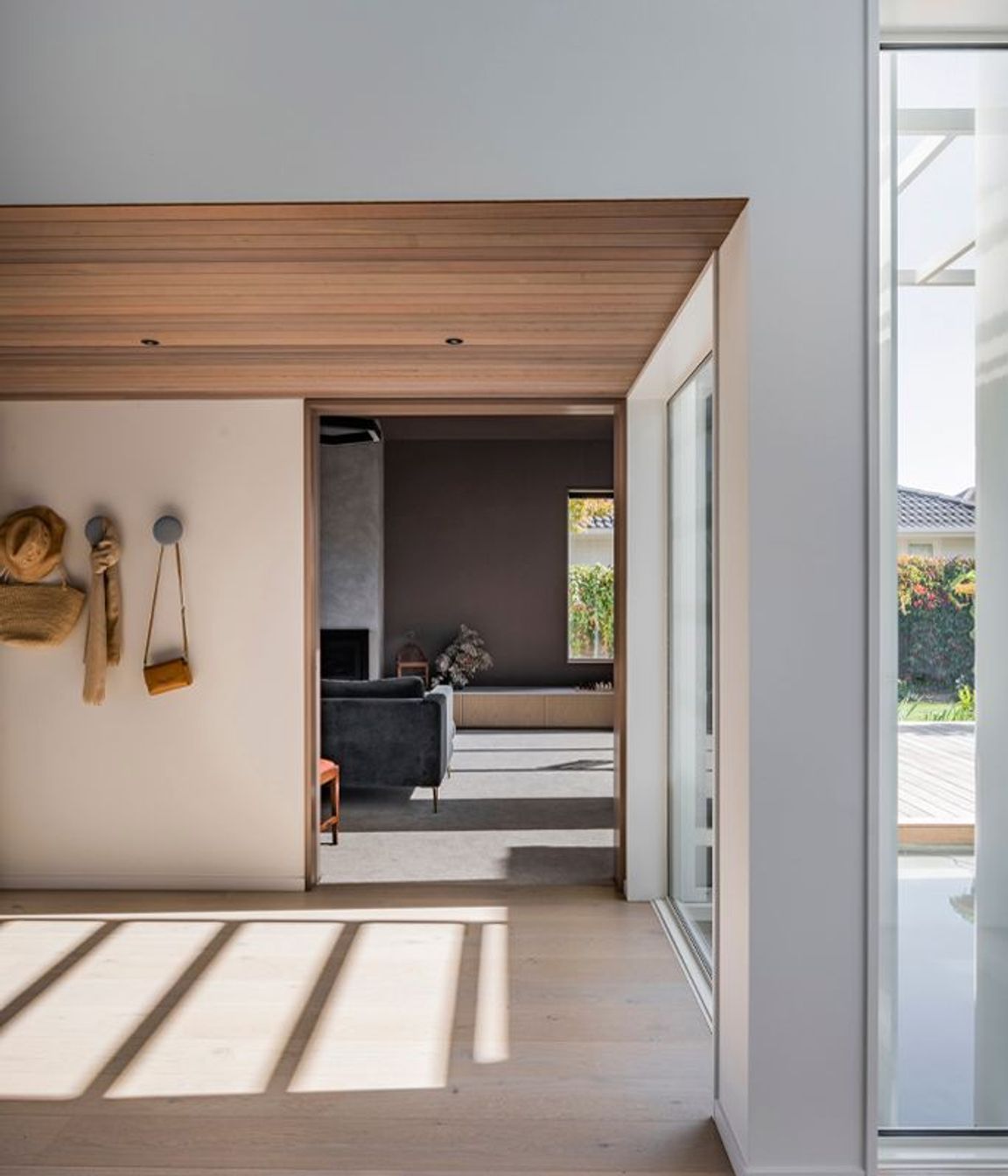 Cedar on the ceiling in the entrance offers a warm welcome.