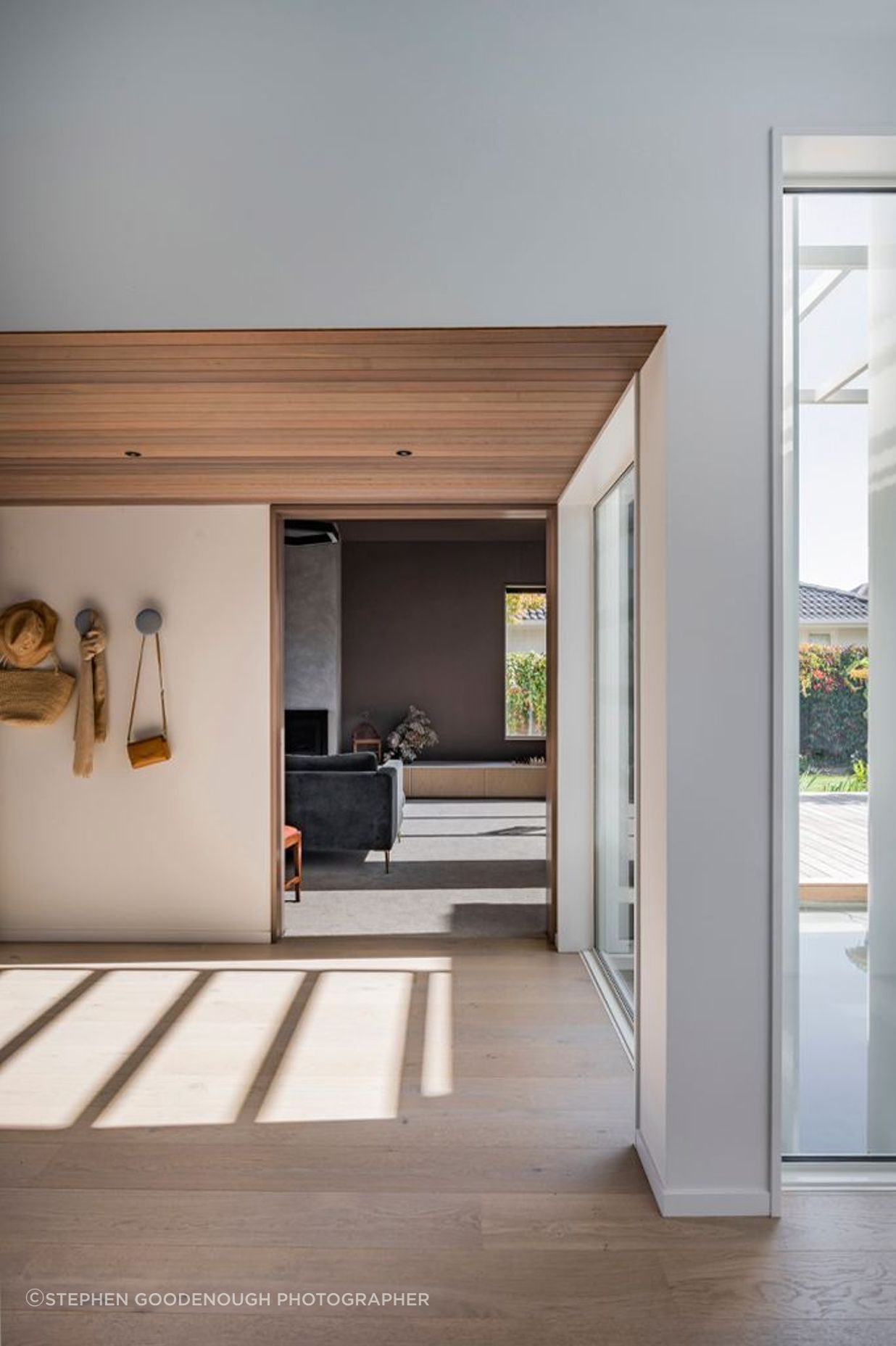 Cedar on the ceiling in the entrance offers a warm welcome.