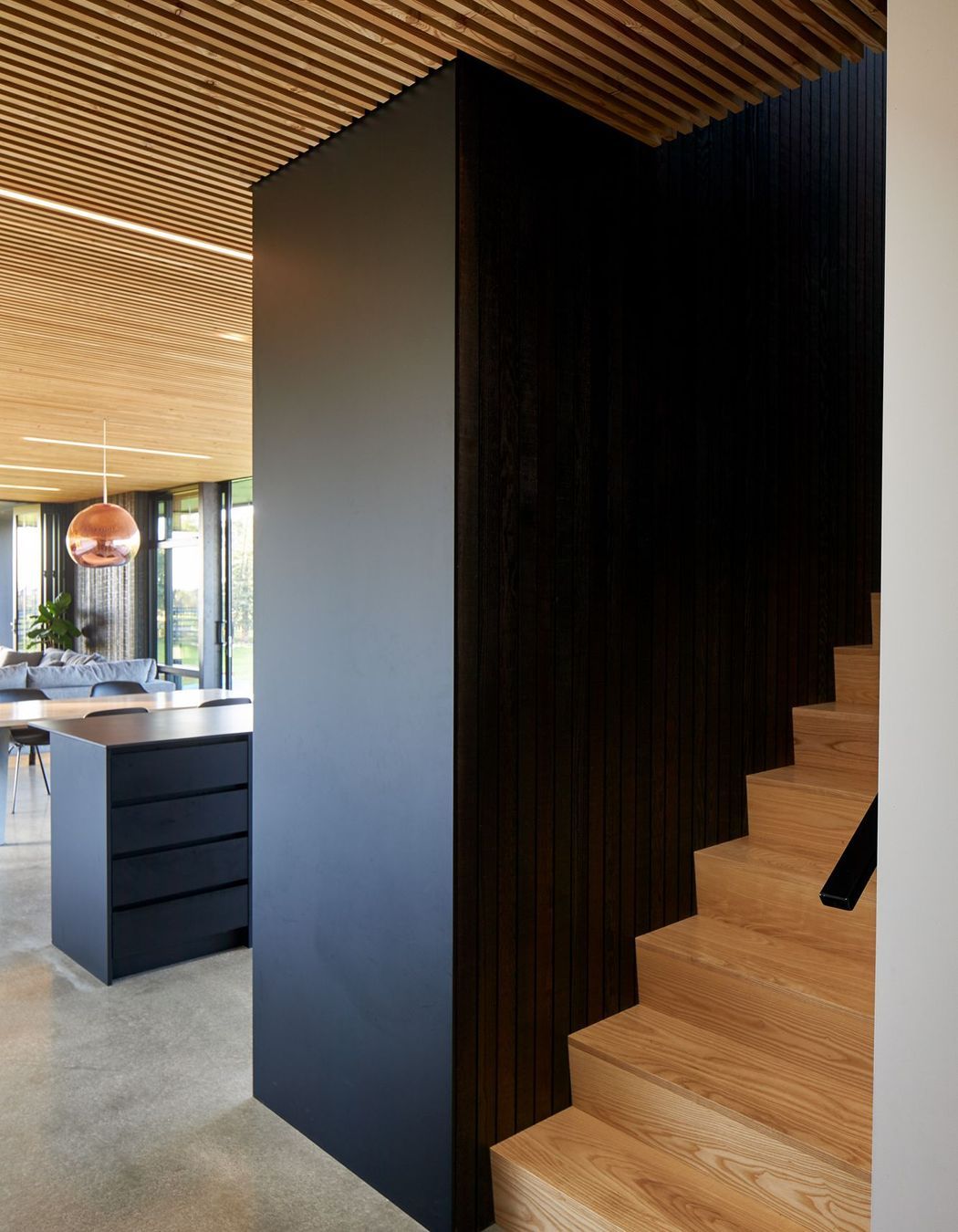 The material palette was pared back to give the home a timeless quality with the mix of timbers, concrete and solid colours creating a sharp contrast and visual interest.