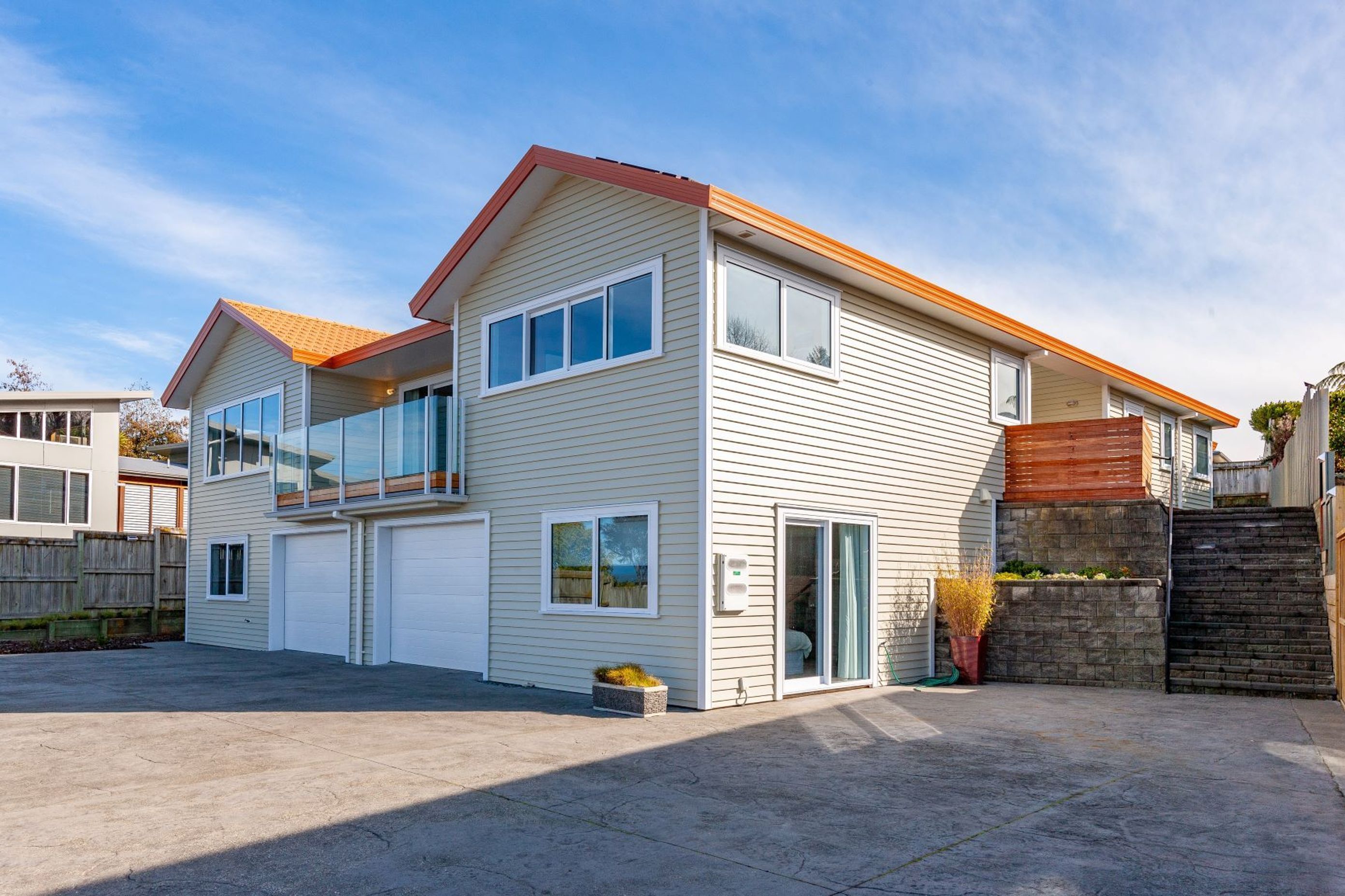 AFTER: Thermally broken double-glazed windows and doors were installed throughout and better quality insulation was installed in all external walls prior to recladding in weatherboard - resulting in a warmer, more comfortable home. 