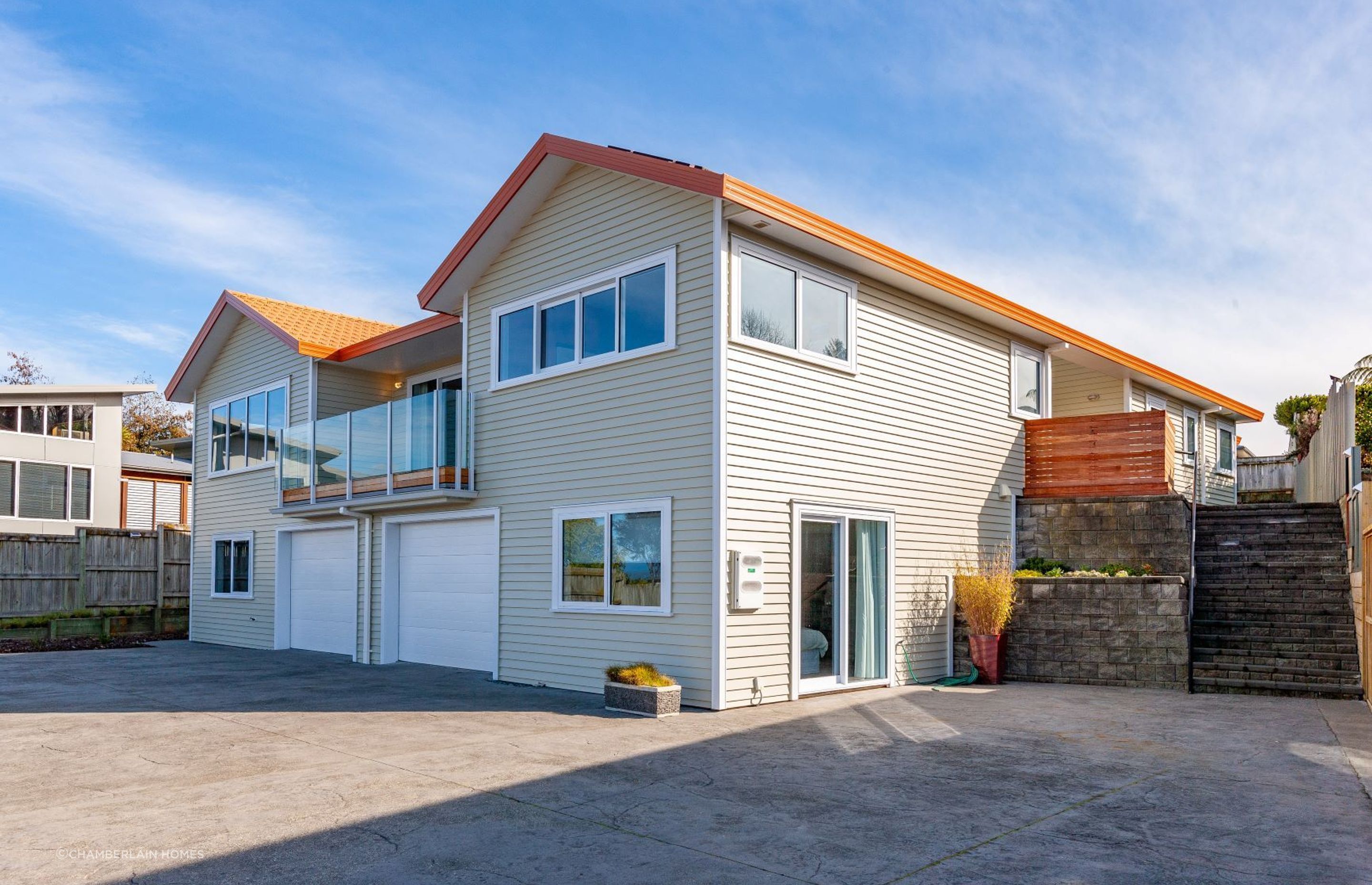 AFTER: Thermally broken double-glazed windows and doors were installed throughout and better quality insulation was installed in all external walls prior to recladding in weatherboard - resulting in a warmer, more comfortable home.
