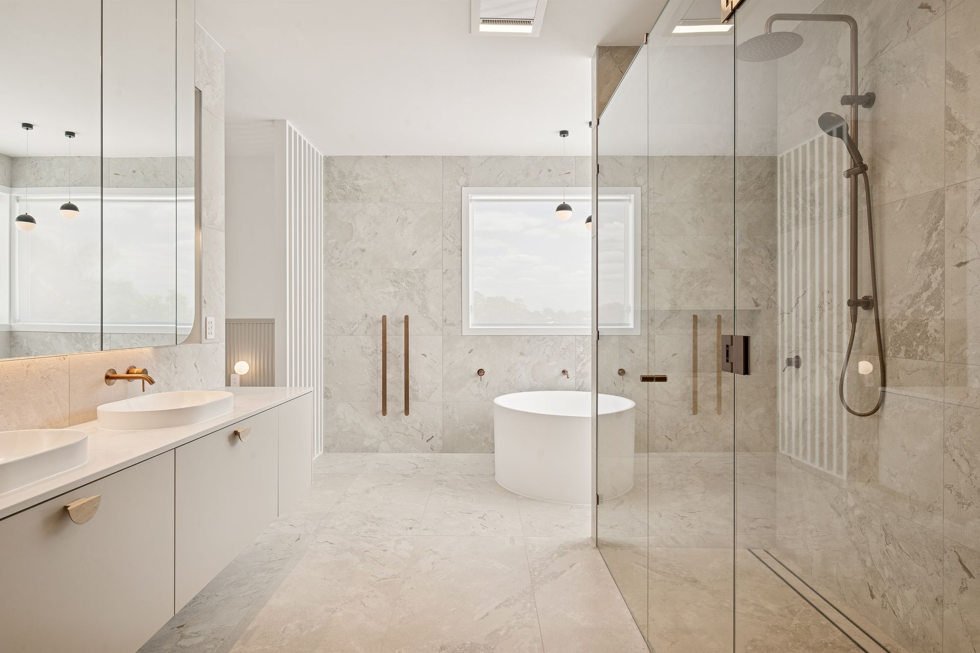 The bath outlook stretches over rooftops to the hills beyond.