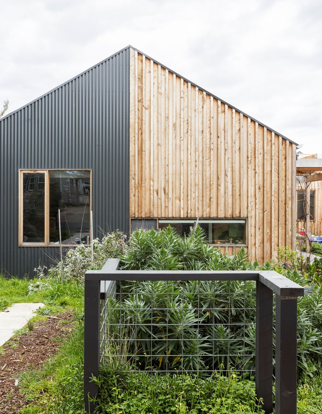 Durable external cladding materials with low embodied energy