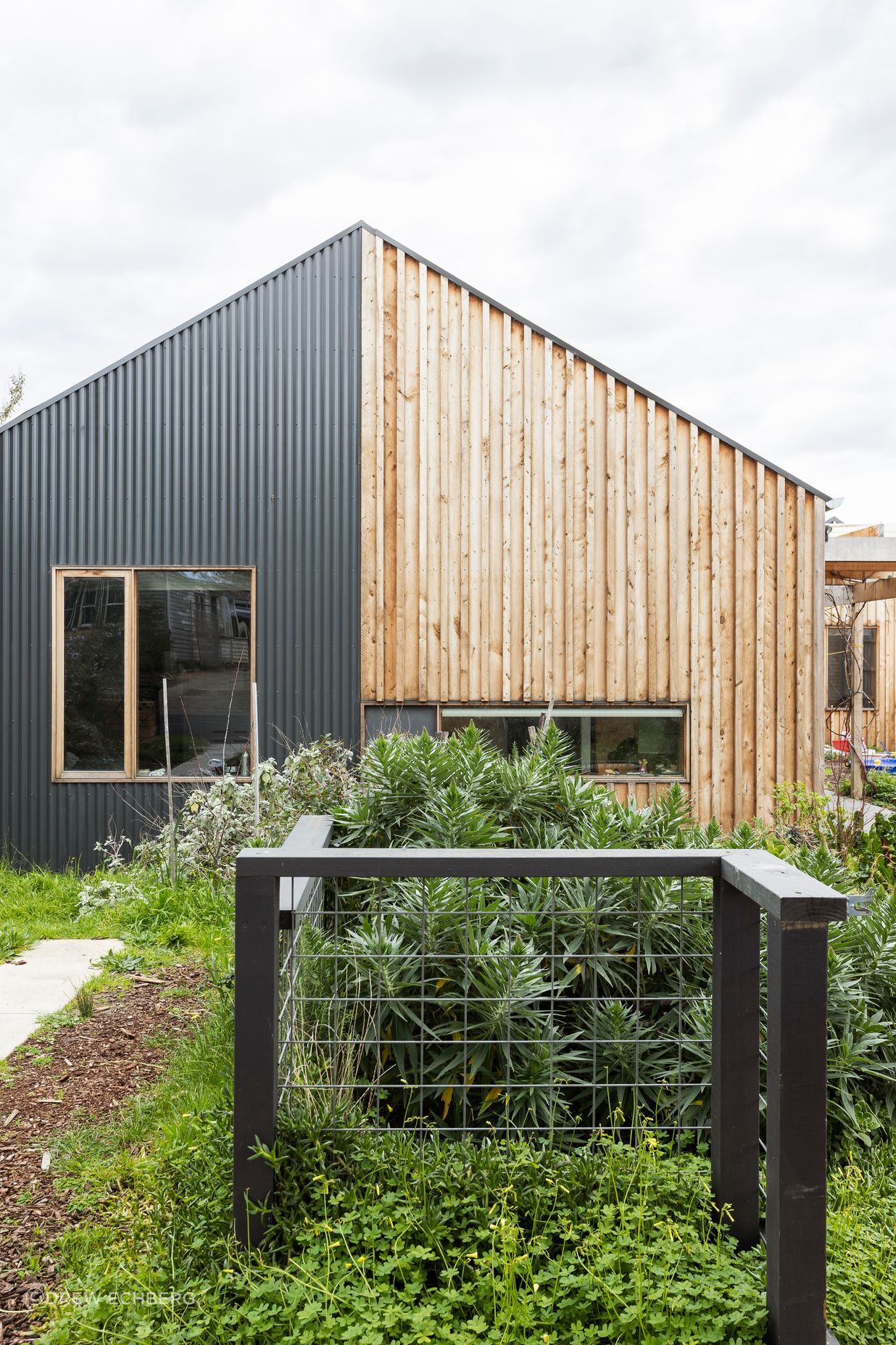 Durable external cladding materials with low embodied energy