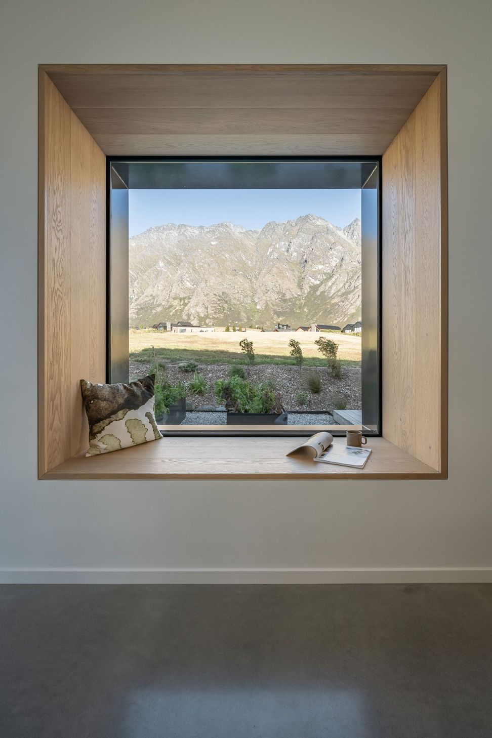 The kitchen features a picture-window bench space for reading and relaxing.