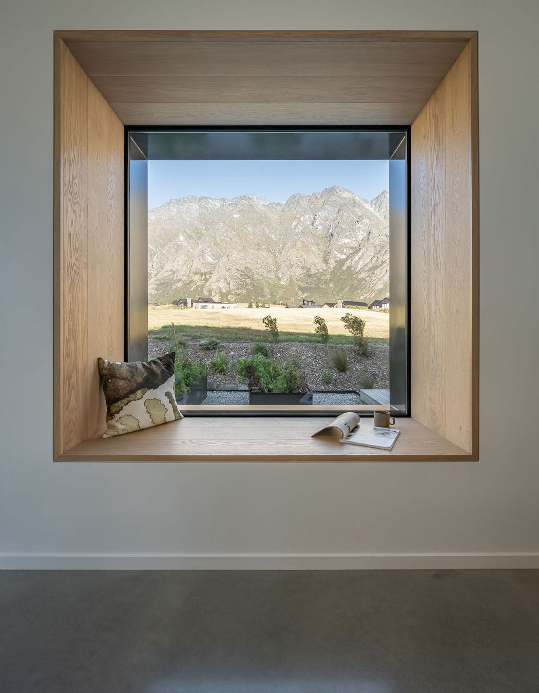 The kitchen features a picture-window bench space for reading and relaxing.