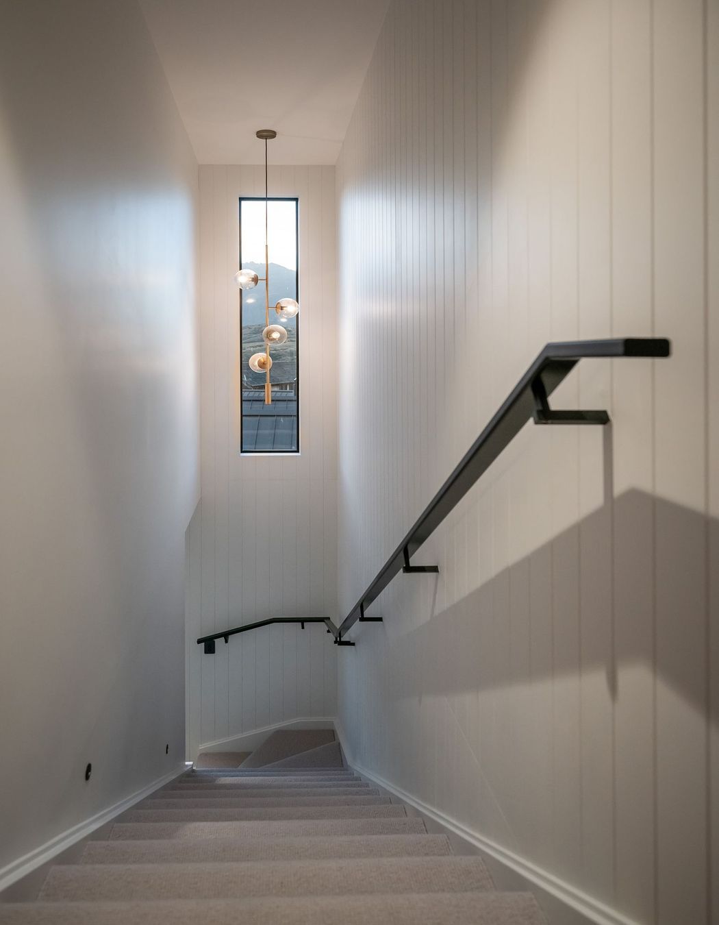 The stairwell down to the laundry and garage.