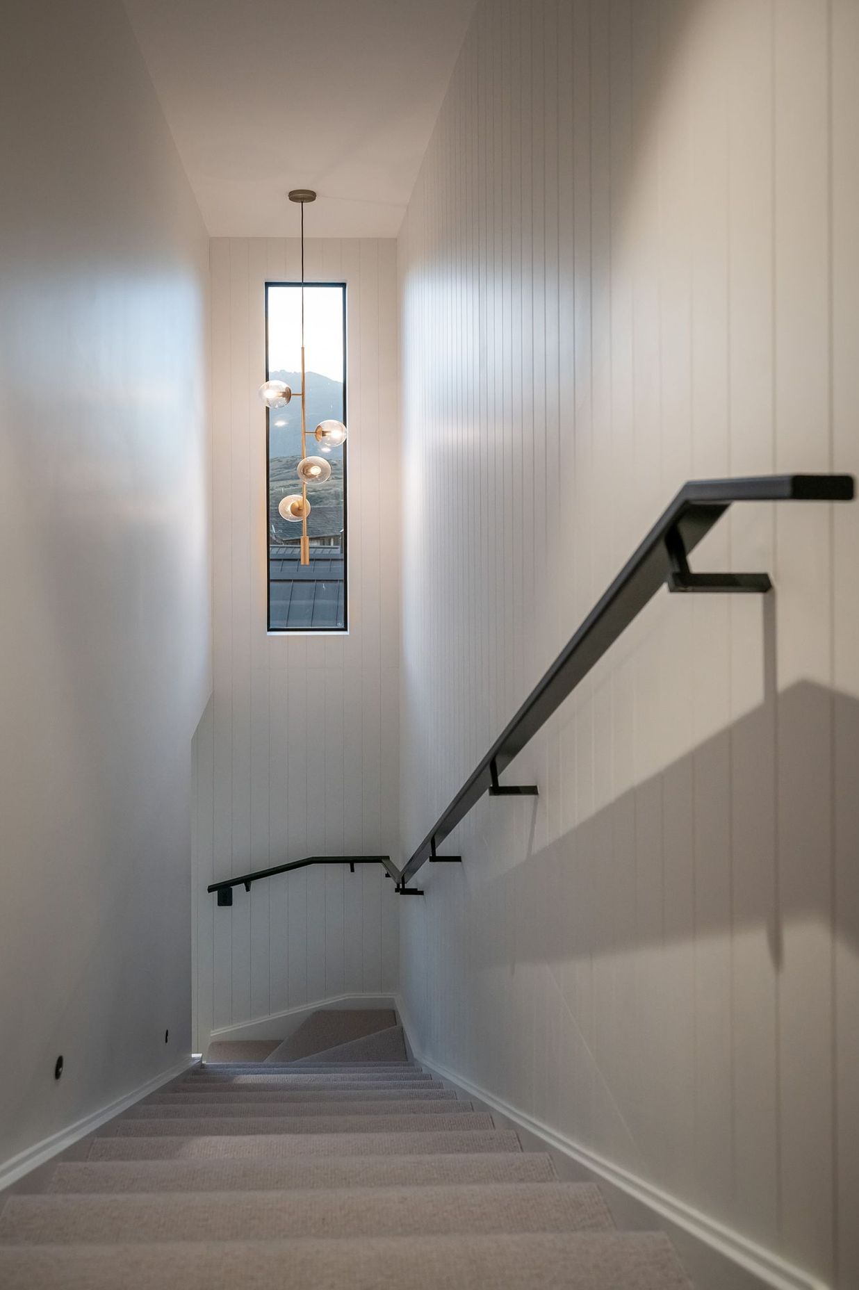 The stairwell down to the laundry and garage.