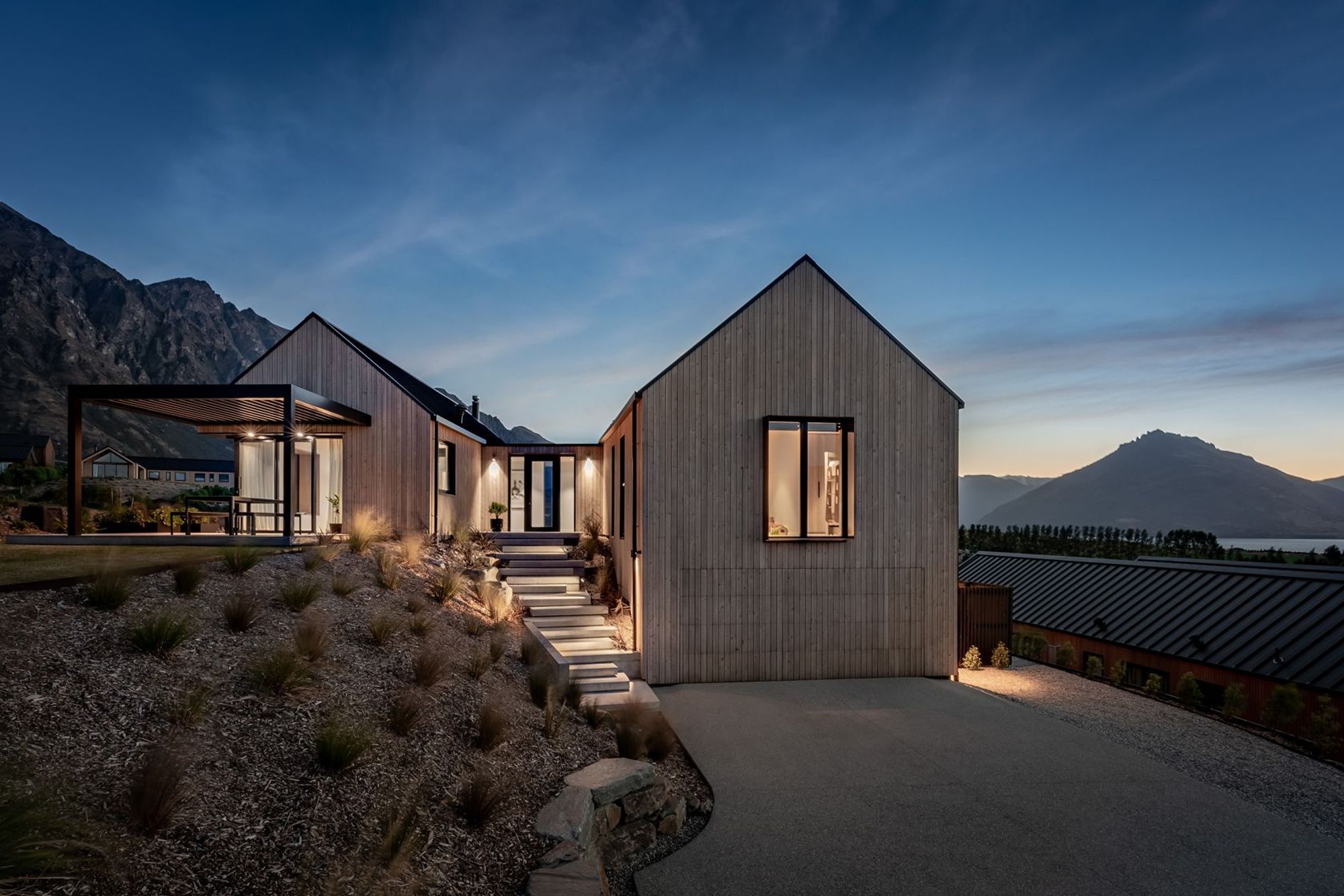The garage is accessed through an almost invisible timber-clad sectional door that means the building form remains seamless.