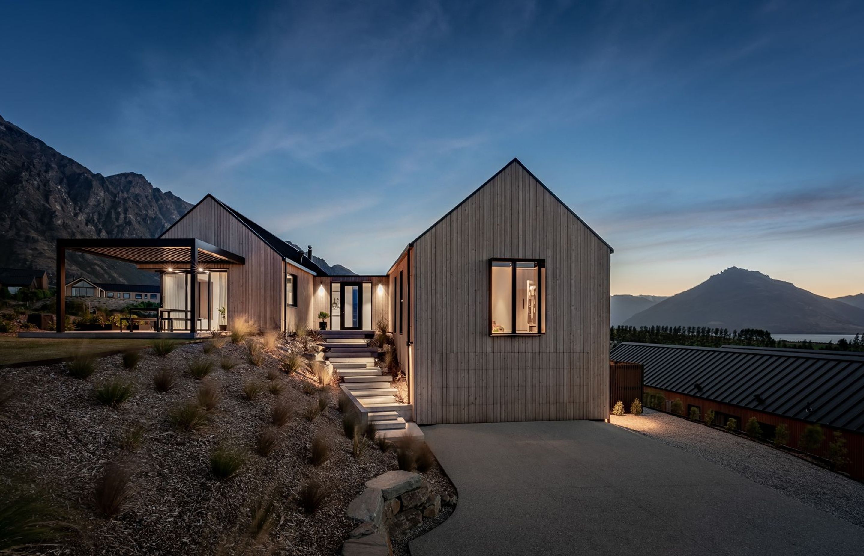 The garage is accessed through an almost invisible timber-clad sectional door that means the building form remains seamless.