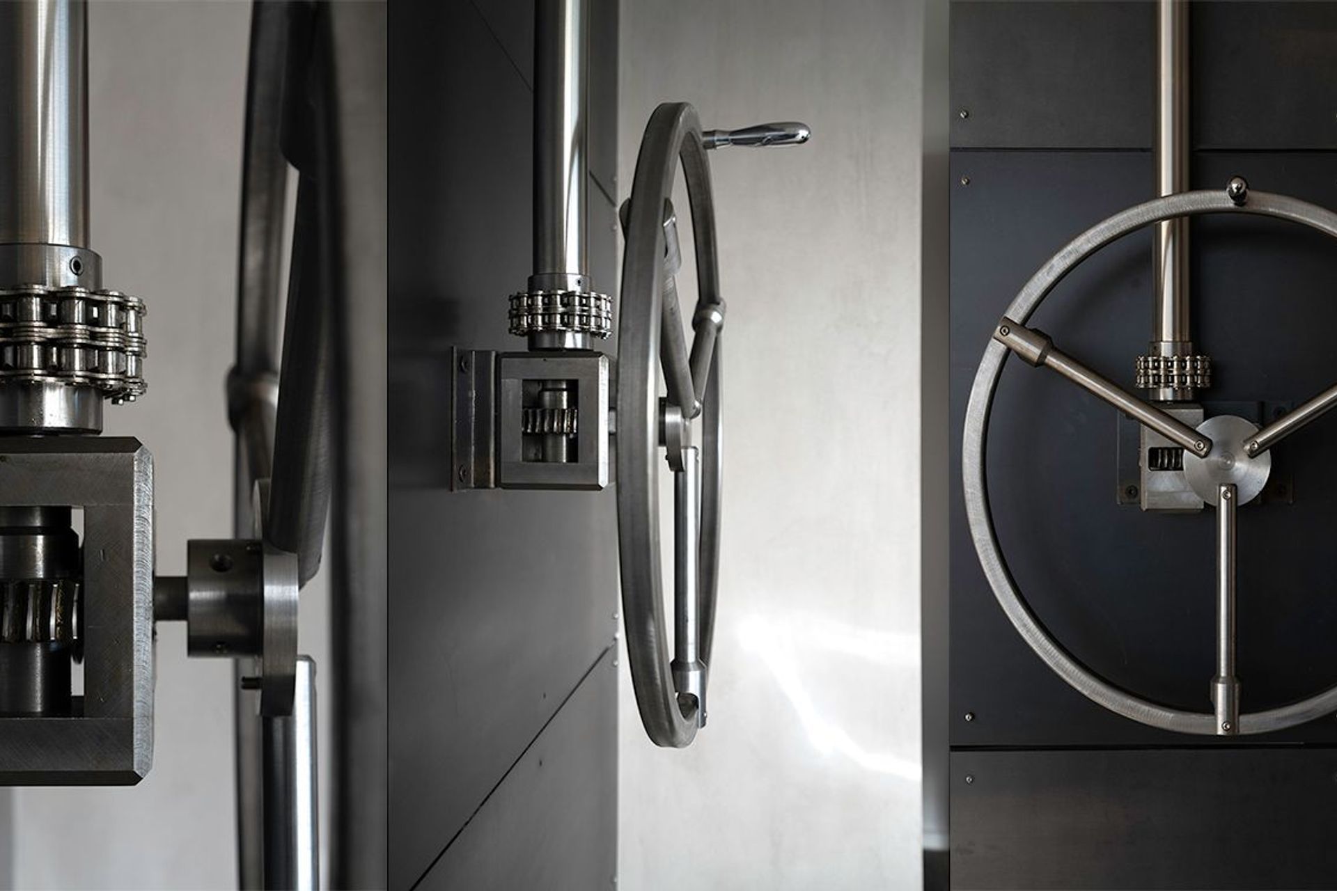 Wheel mechanism for pivoting steel wall.