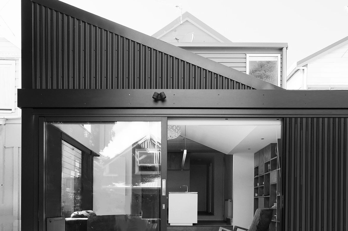 Corrugate Clad Lofty Plywood Addition