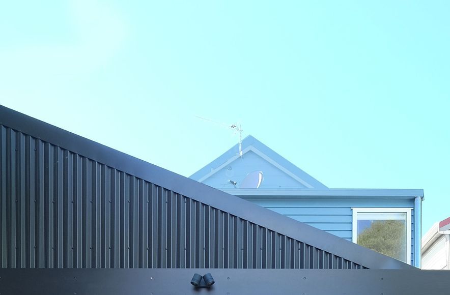 Corrugate Clad Lofty Plywood Addition