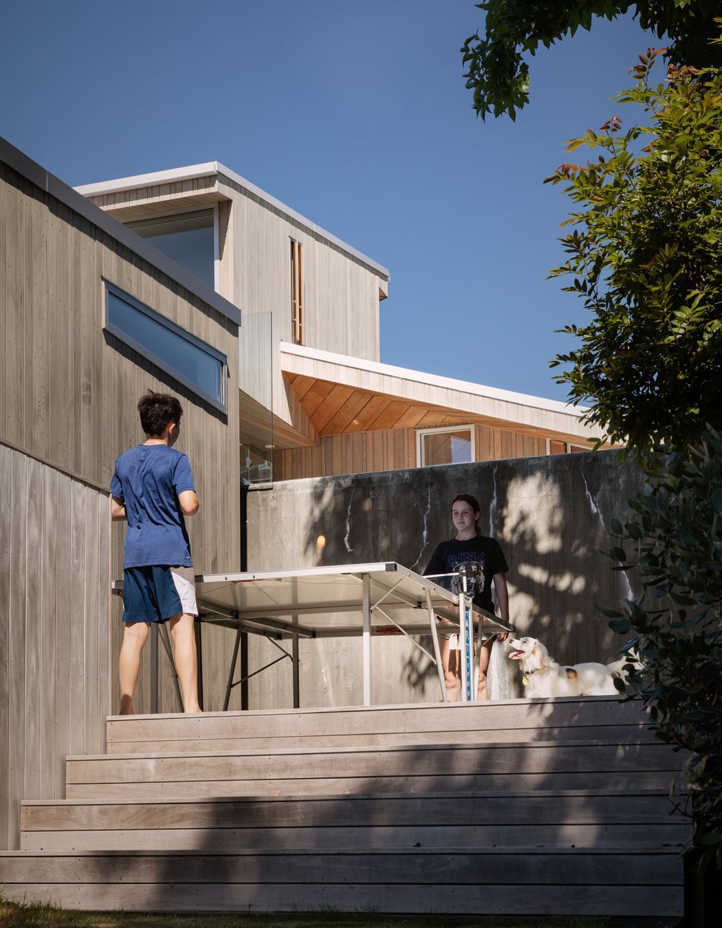The lower portion of the house has been given over to the children, who enjoy their own dedicated spaces for multiple activities.