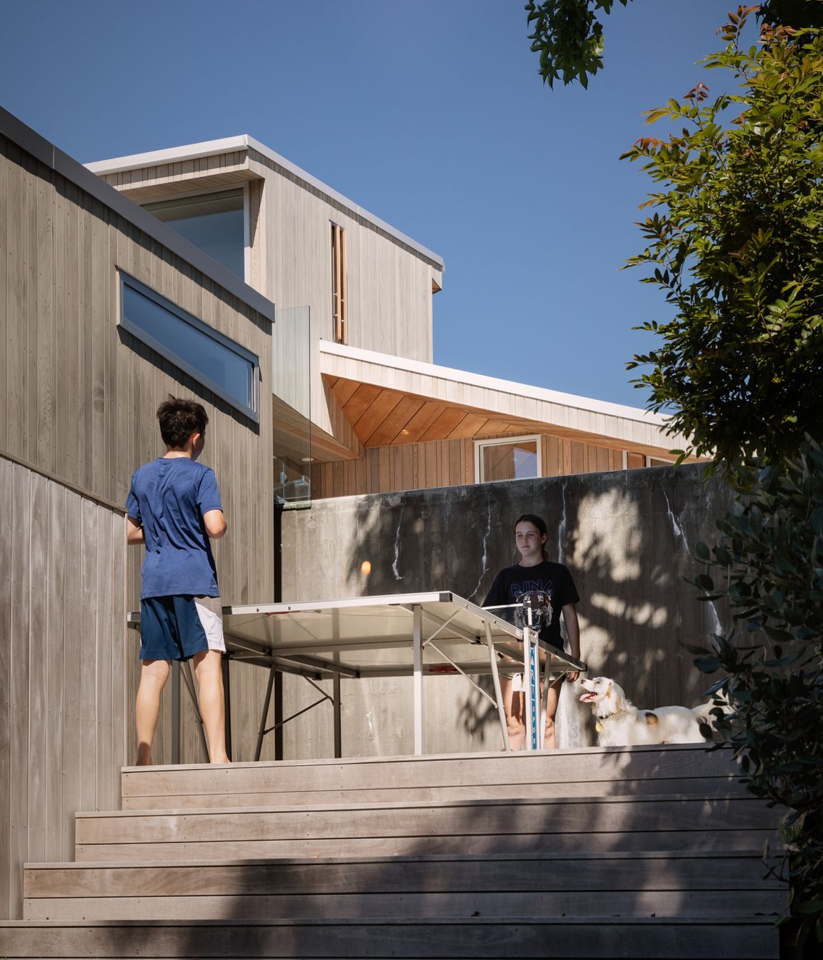 The lower portion of the house has been given over to the children, who enjoy their own dedicated spaces for multiple activities.