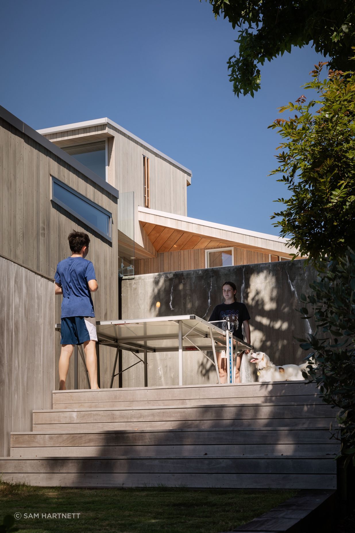 The lower portion of the house has been given over to the children, who enjoy their own dedicated spaces for multiple activities.