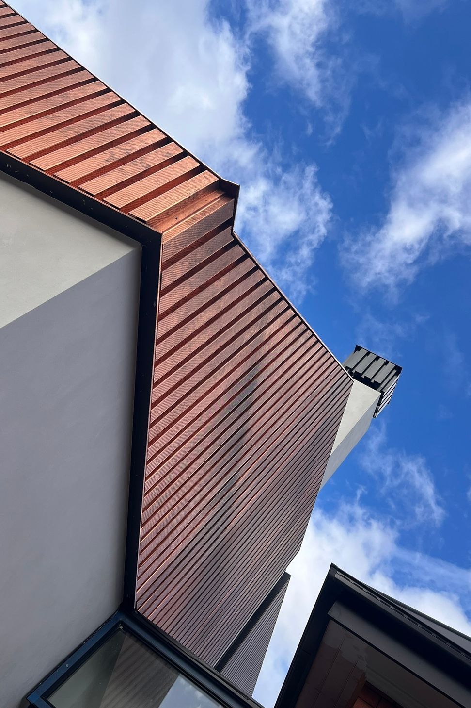copper-tapers-and-chimney-cowl-installation.jpeg