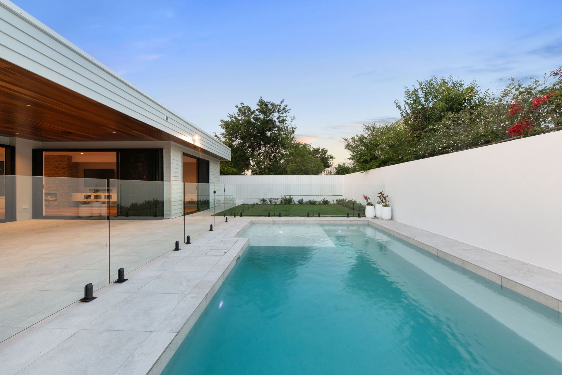 A generous shallow ledge makes the pool as much for lounging as for laps.