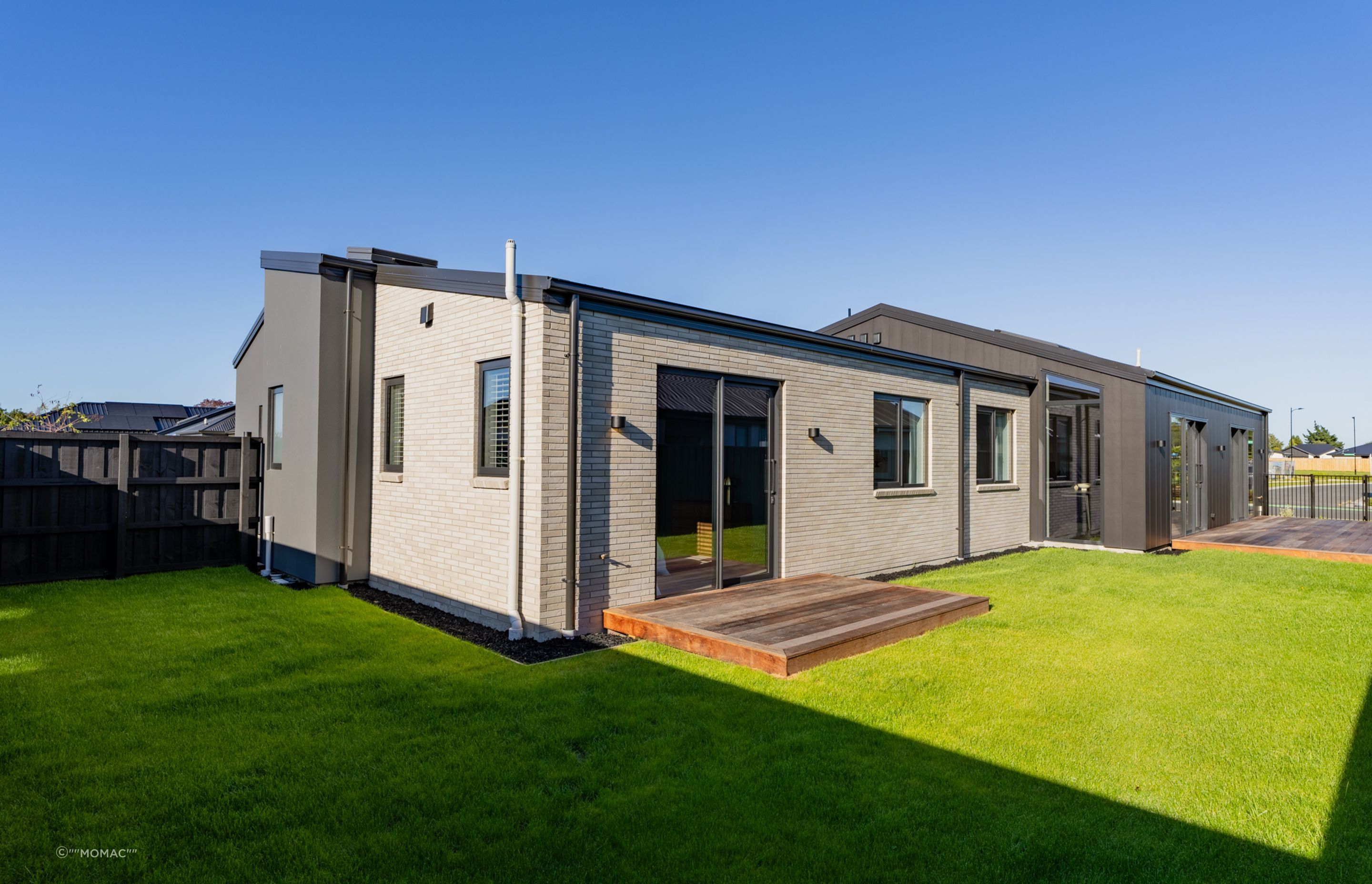 Exterior of the Home Showcasing Three Types of Cladding