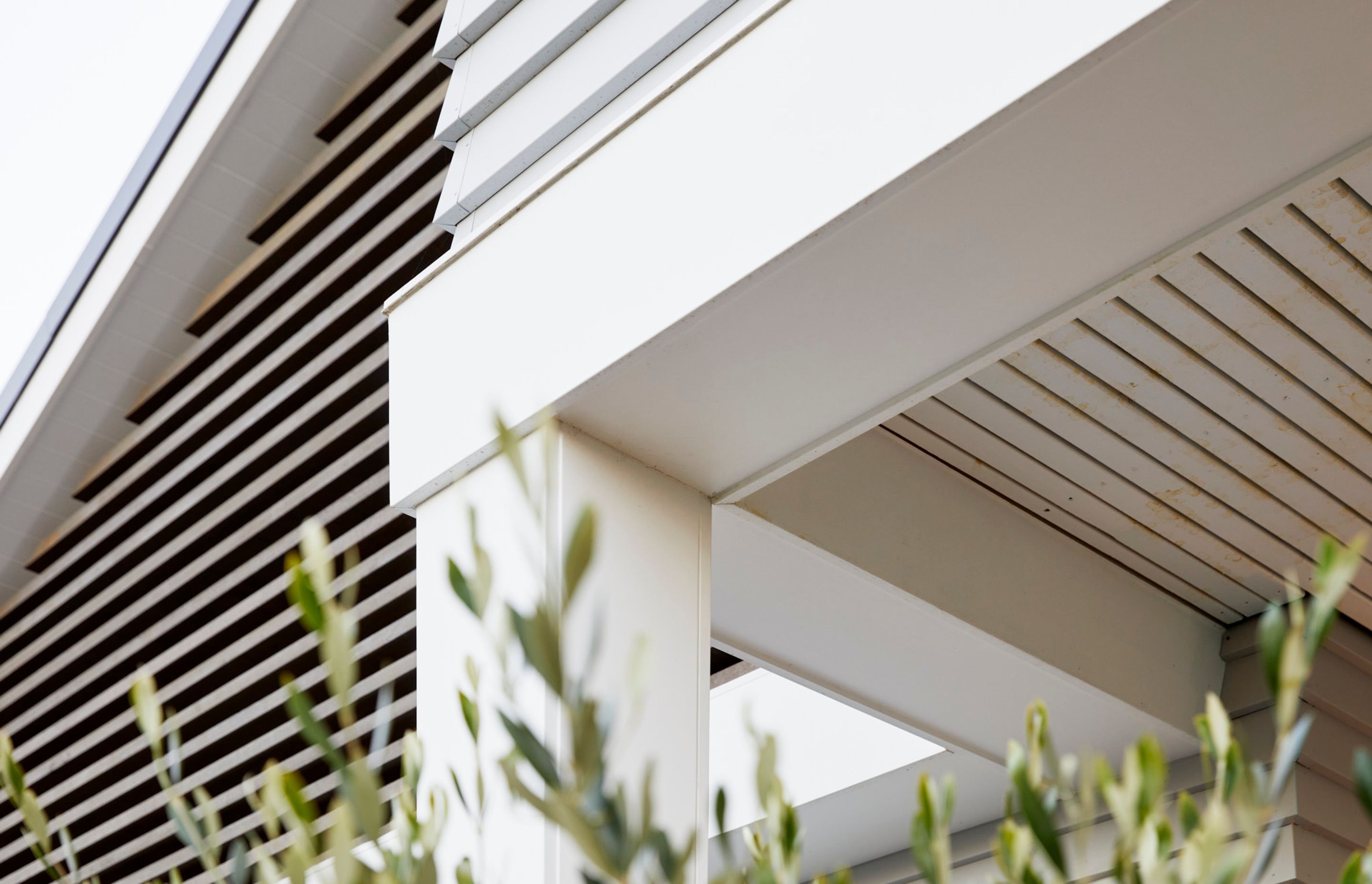 The exterior is classic weatherboard with feature cedar finns. The eaves feature battens aligned in an exacting manner right down to the nail points. details count!