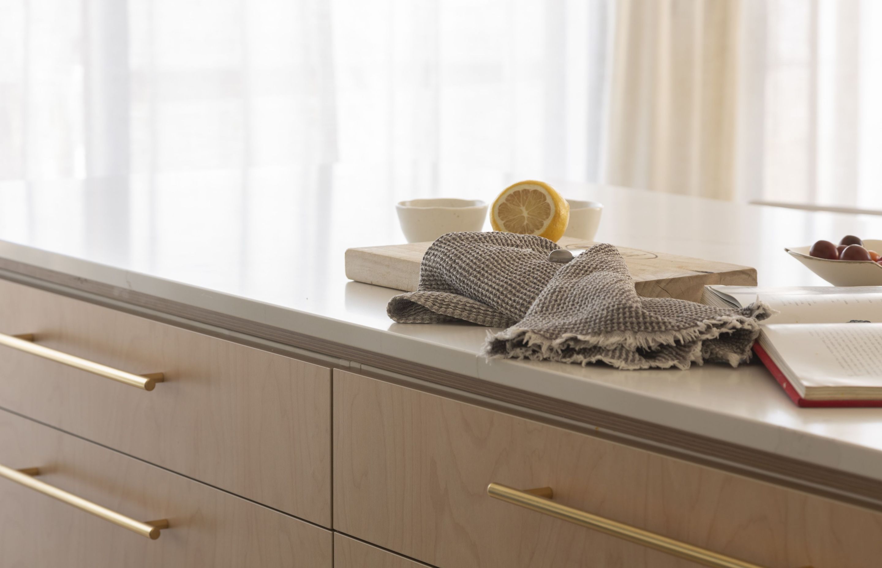 kitchen-island-design-brass-handles-ply-cabinetry-Stacey-Gillies-Kitchen-Design.jpg