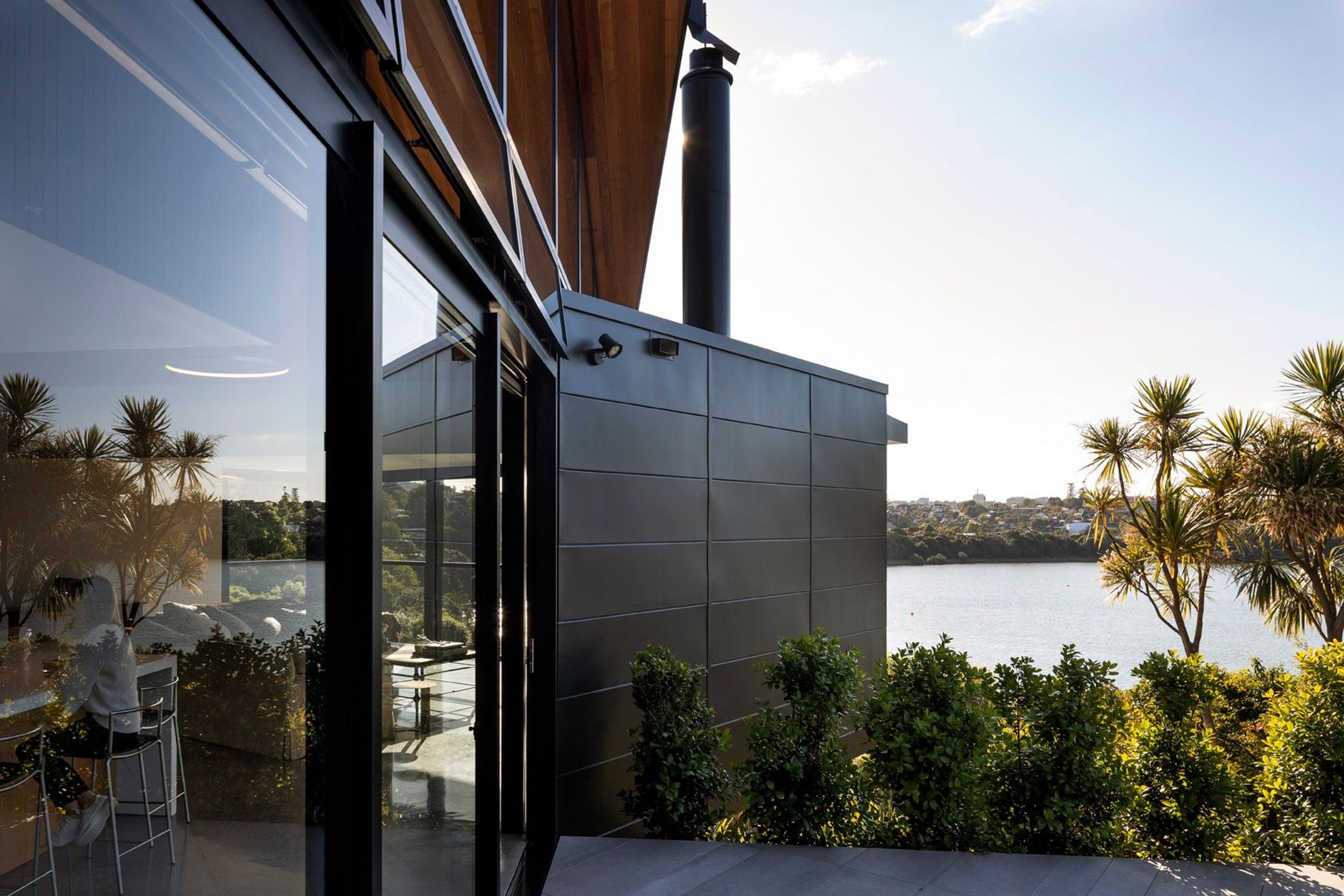 "The three-dimensional facade acts as an instrument for engaging with the garden and the basin, while expressing the dynamic forces of the volcanic contours,” says Architect Wendy Shacklock.