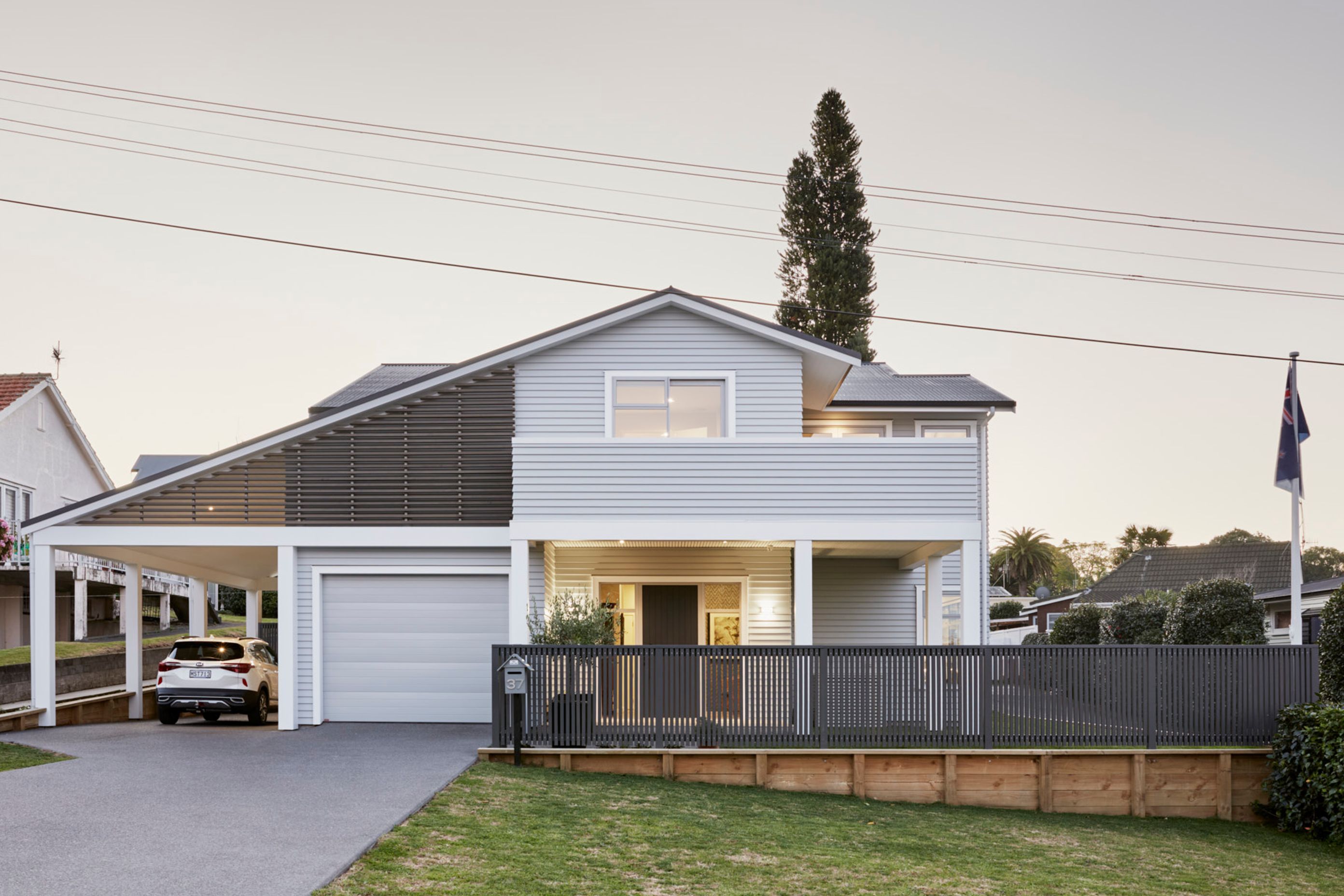 The exterior is classic weatherboard with feature cedar finns. The eaves feature battens aligned in an exacting manner right down to the nail points. details count!