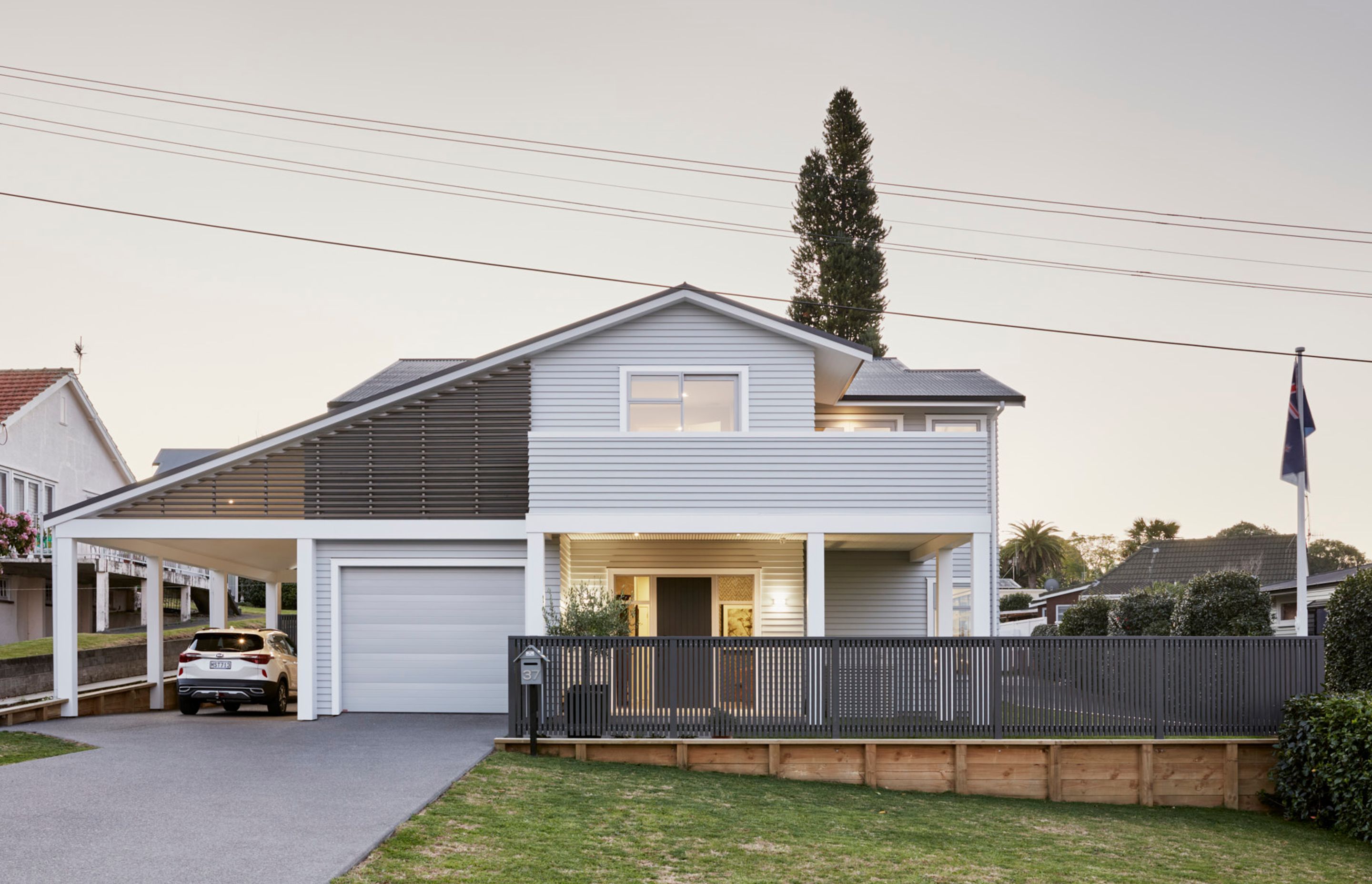 The exterior is classic weatherboard with feature cedar finns. The eaves feature battens aligned in an exacting manner right down to the nail points. details count! 