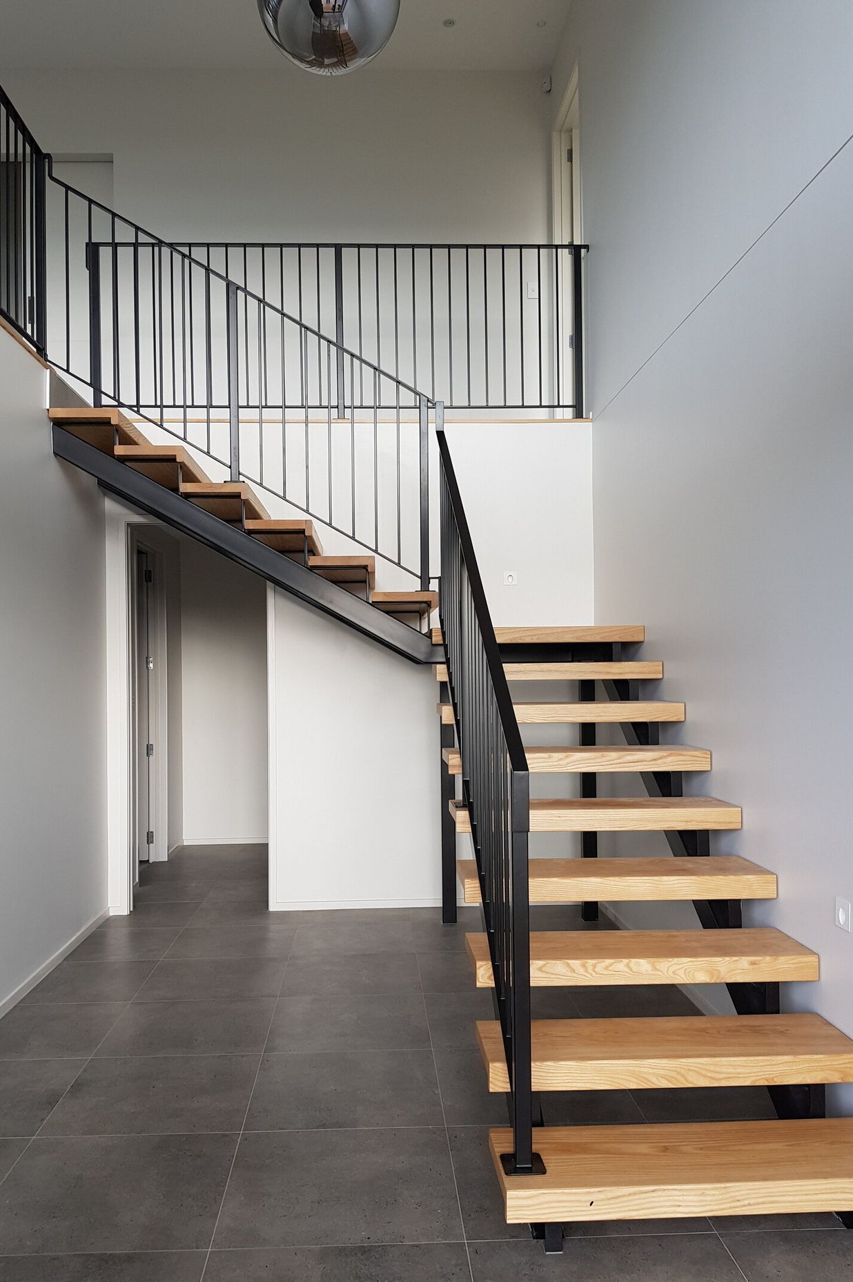 The Stairs from the front entry