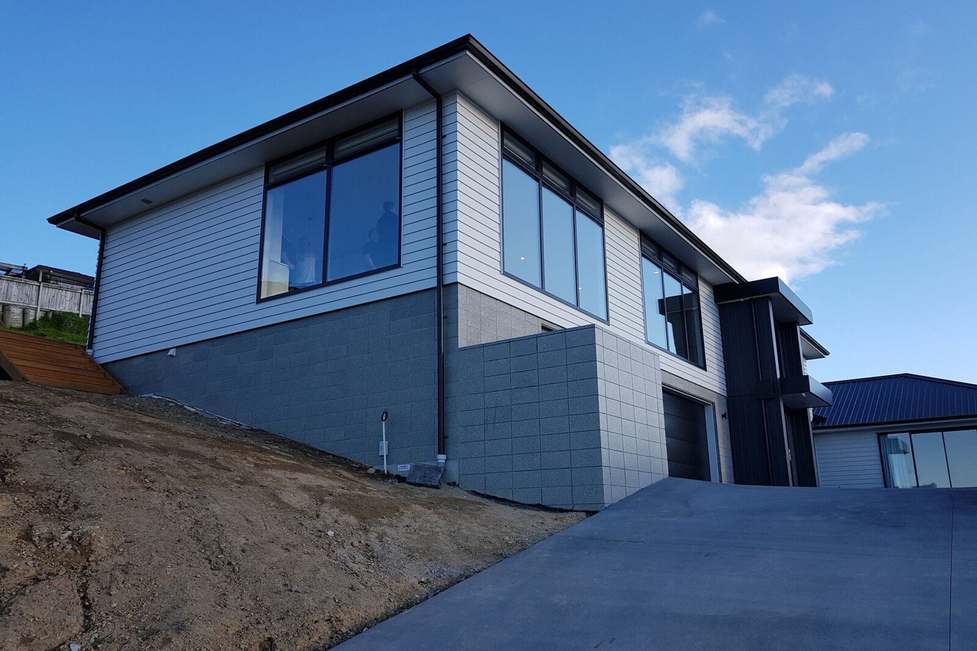 House side view - looking back up the driveway