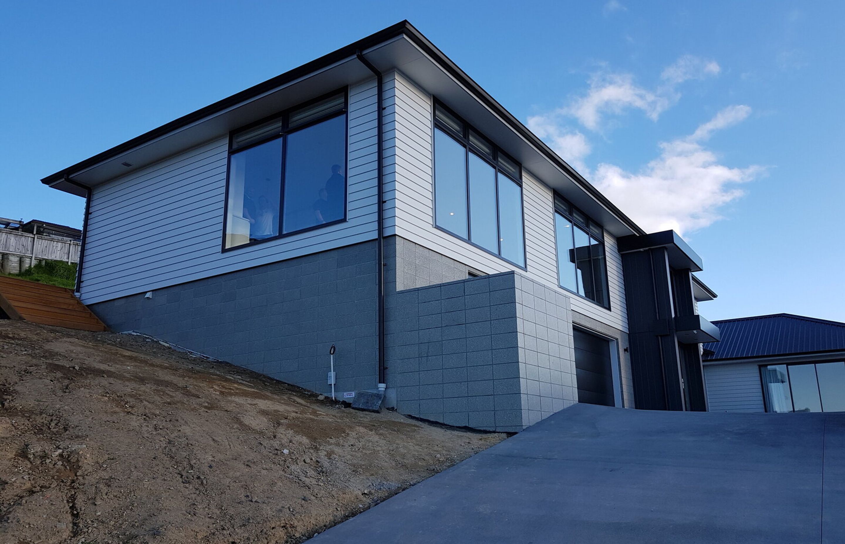 House side view - looking back up the driveway
