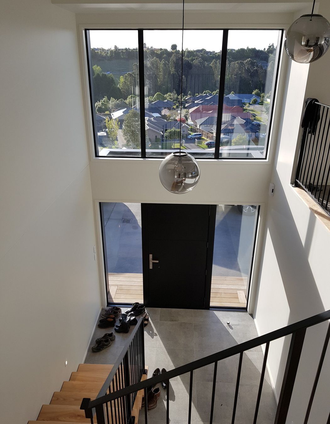 Top of the stairs looking down at the front entry