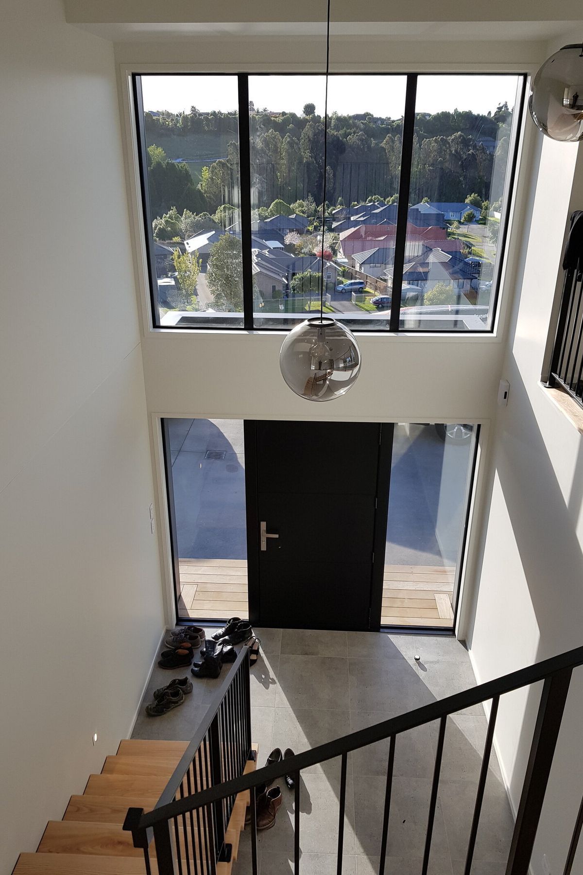 Top of the stairs looking down at the front entry
