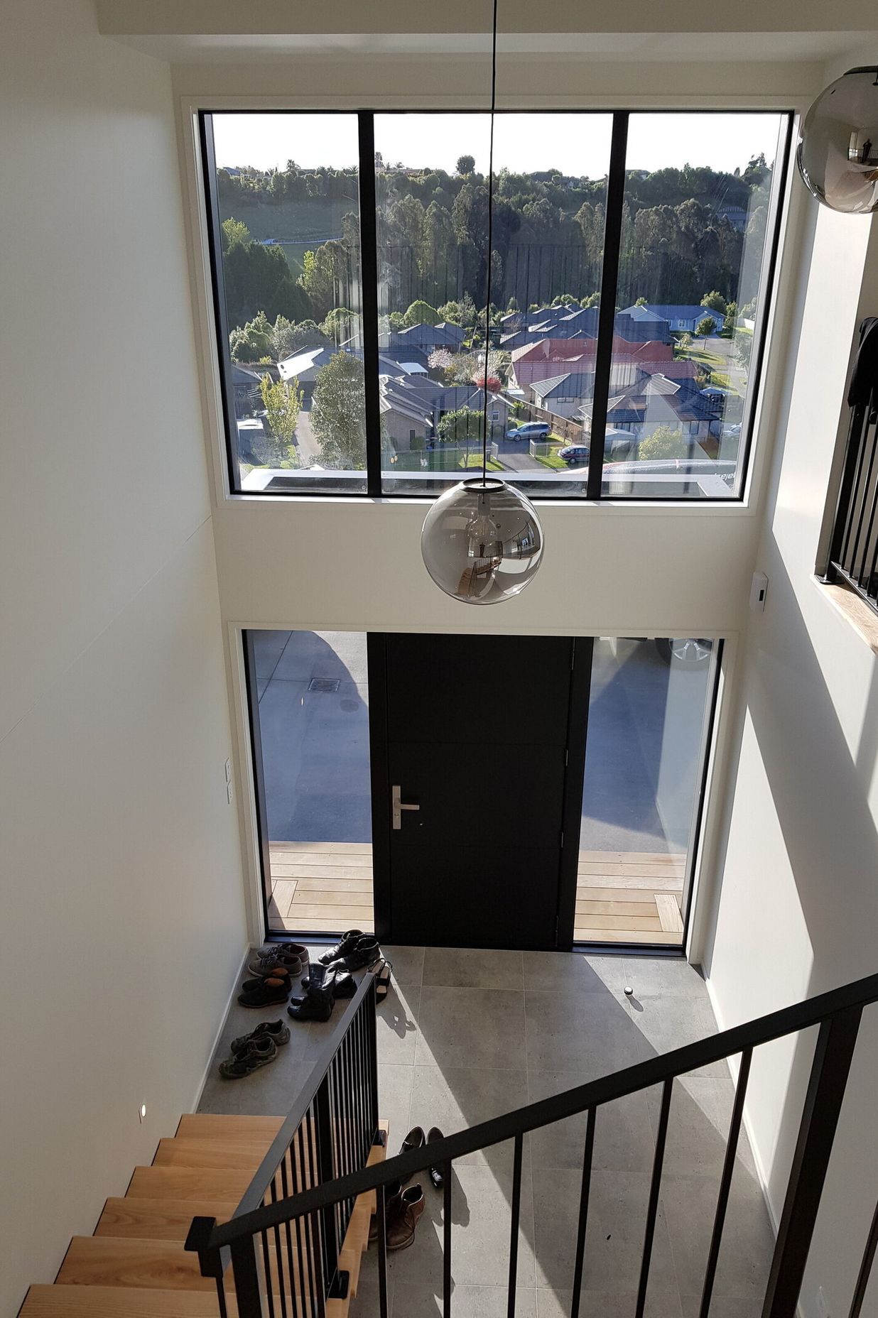 Top of the stairs looking down at the front entry