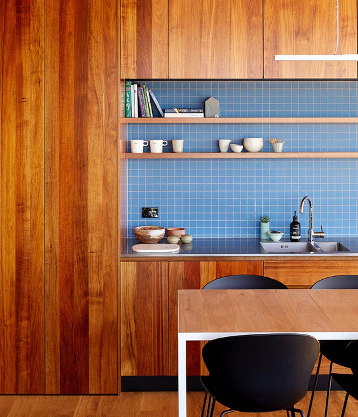 Patchwork Architecture designed the kitchen. The floors and ceilings are VidaSpace oak flooring.