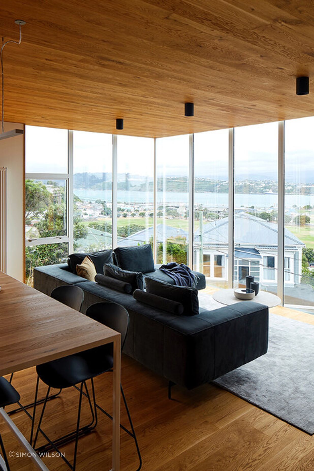 The living space captures stunning views of Wellington.