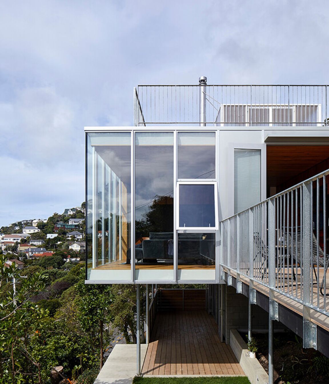 Care was taken to create a lawn that’s sheltered and private despite the steep site.