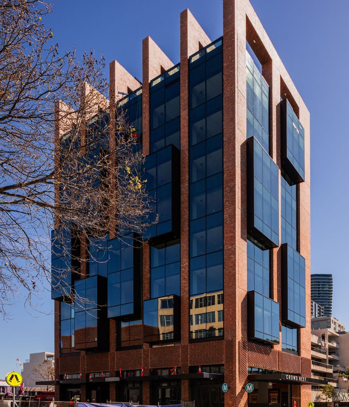 Crows Nest Station’s modulated brickwork façade of Namoi Valley Coolibah Cream bricks grounds the building within the local community