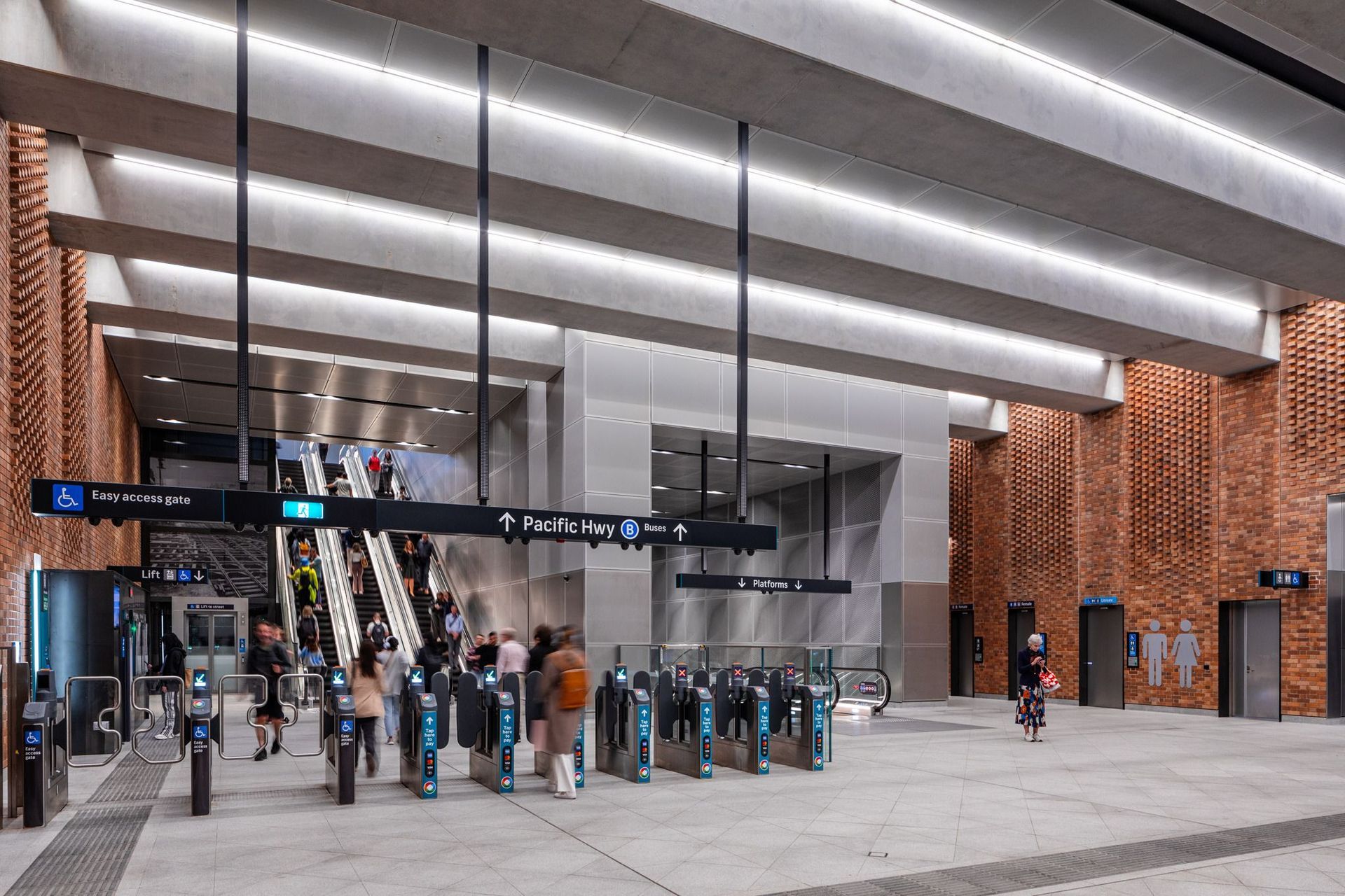 The contrast between the concrete beams and Brick Inlay panels in the concourse is stunning