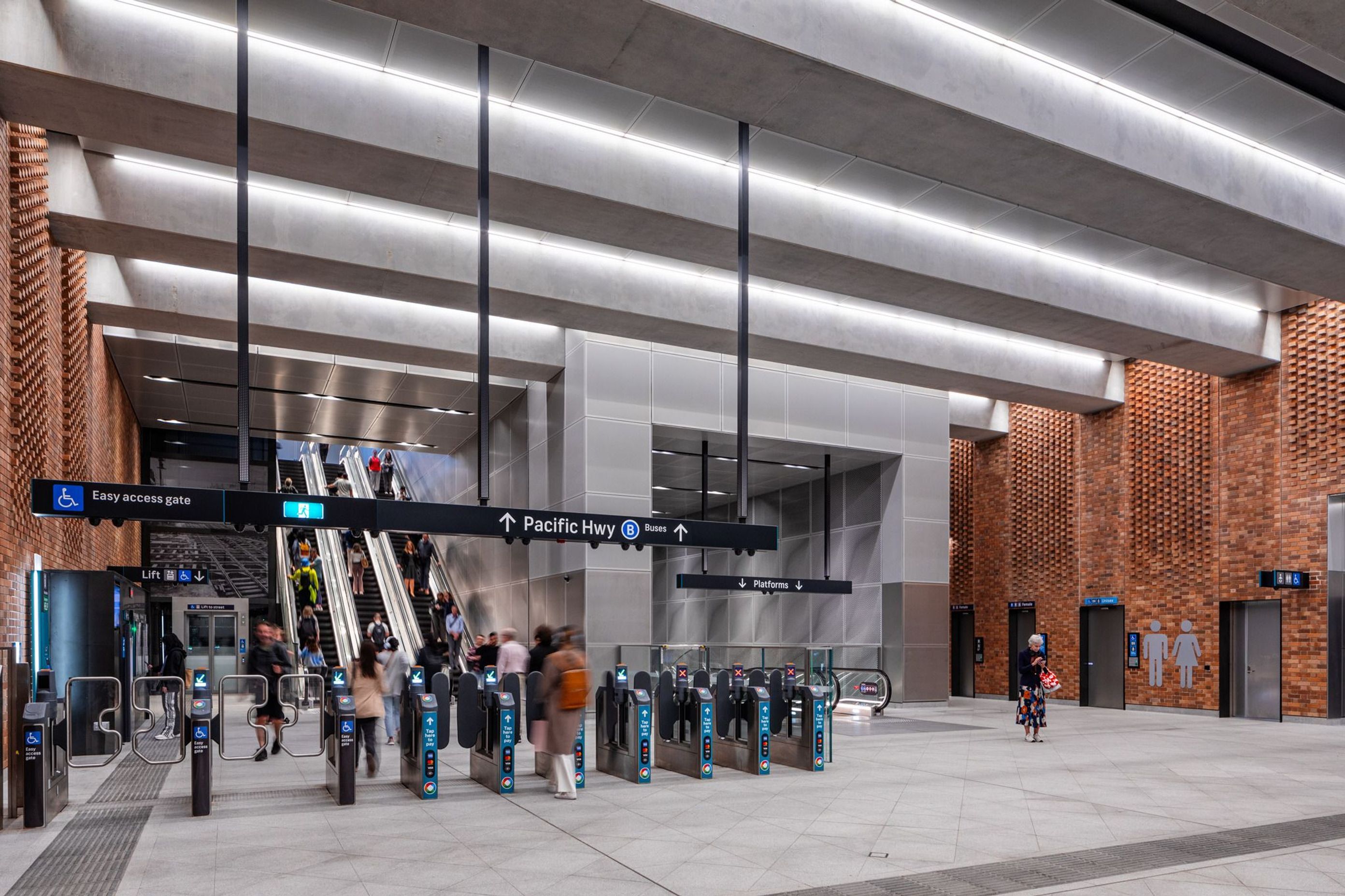 The contrast between the concrete beams and Brick Inlay panels in the concourse is stunning
