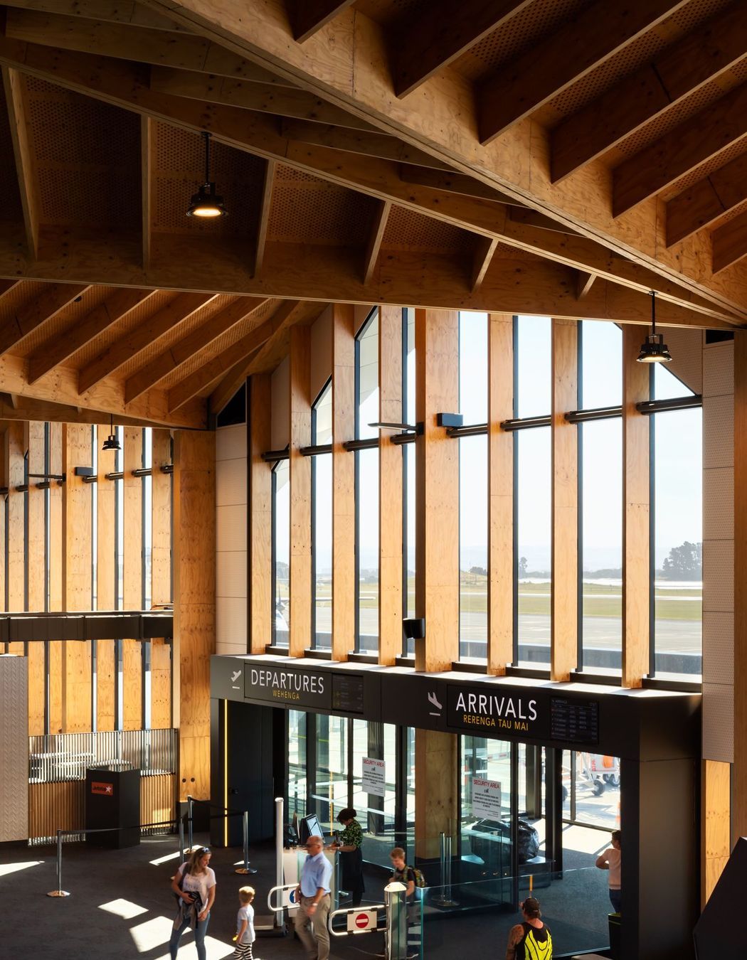 Damage limitation devices, utilising resilient slip friction joint (RSFJ) technology, have been incorporated at the base and mid-way up each of the structural column.
