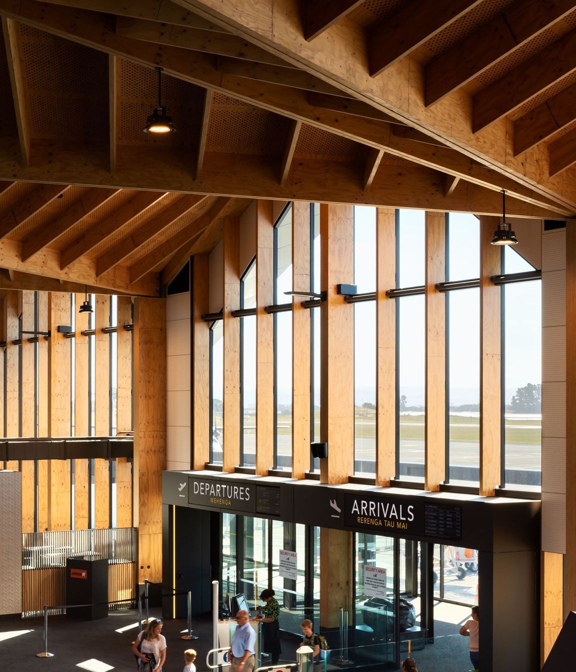 Damage limitation devices, utilising resilient slip friction joint (RSFJ) technology, have been incorporated at the base and mid-way up each of the structural column.