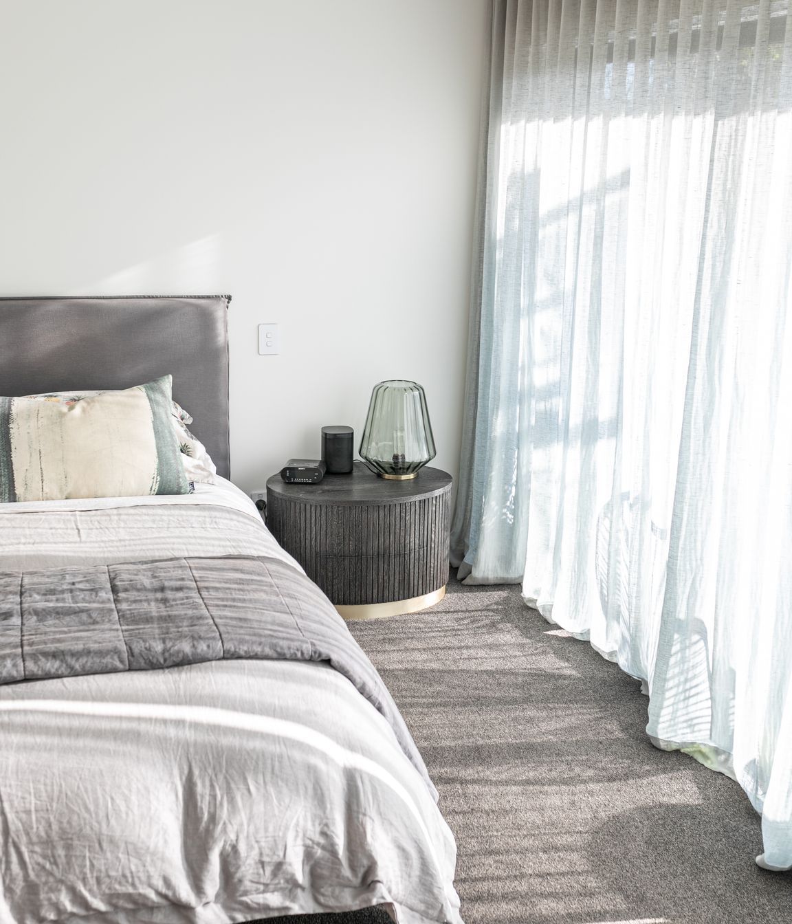 Natural light flows through from wall to wall glazing.