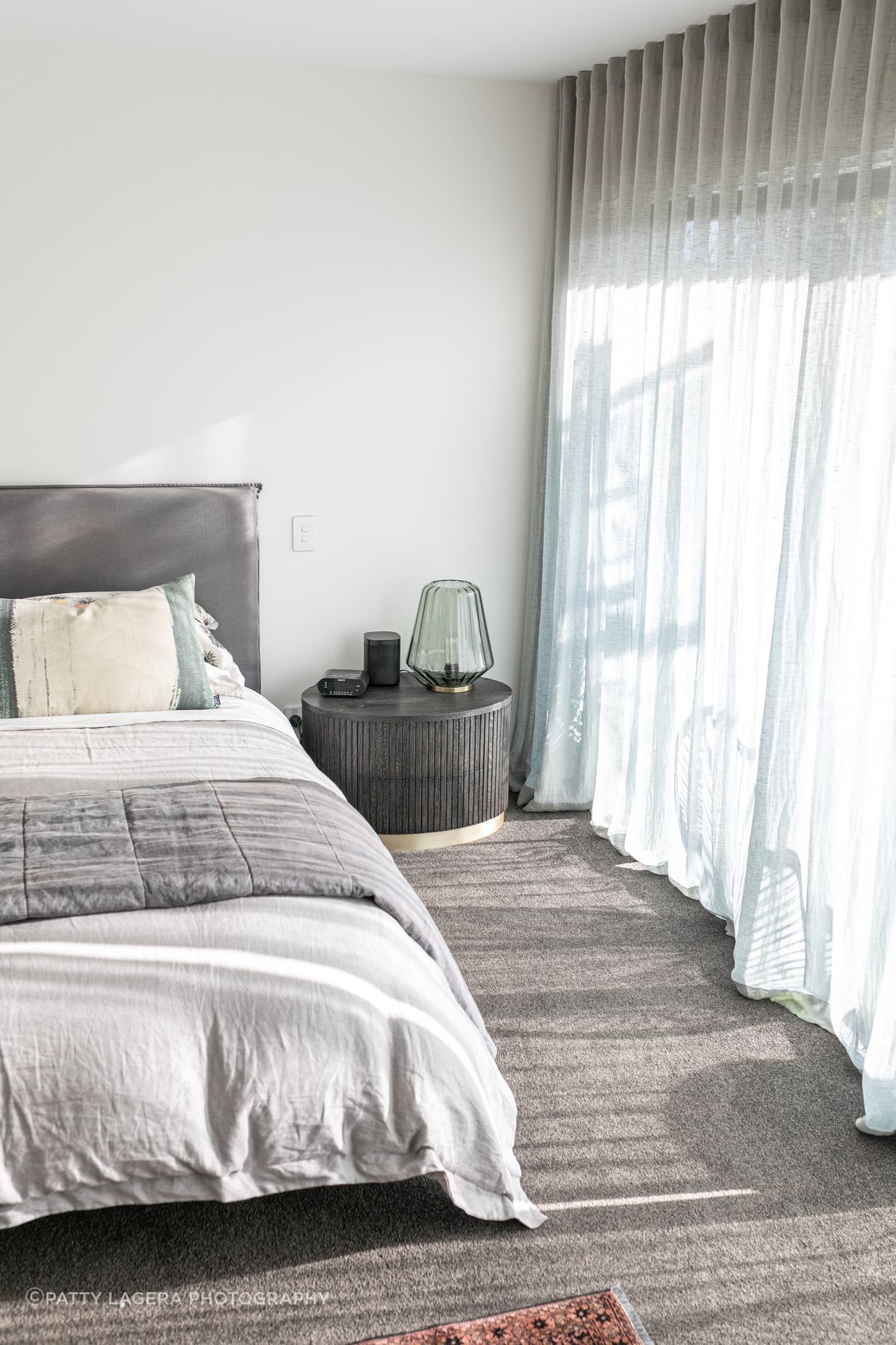 Natural light flows through from wall to wall glazing.