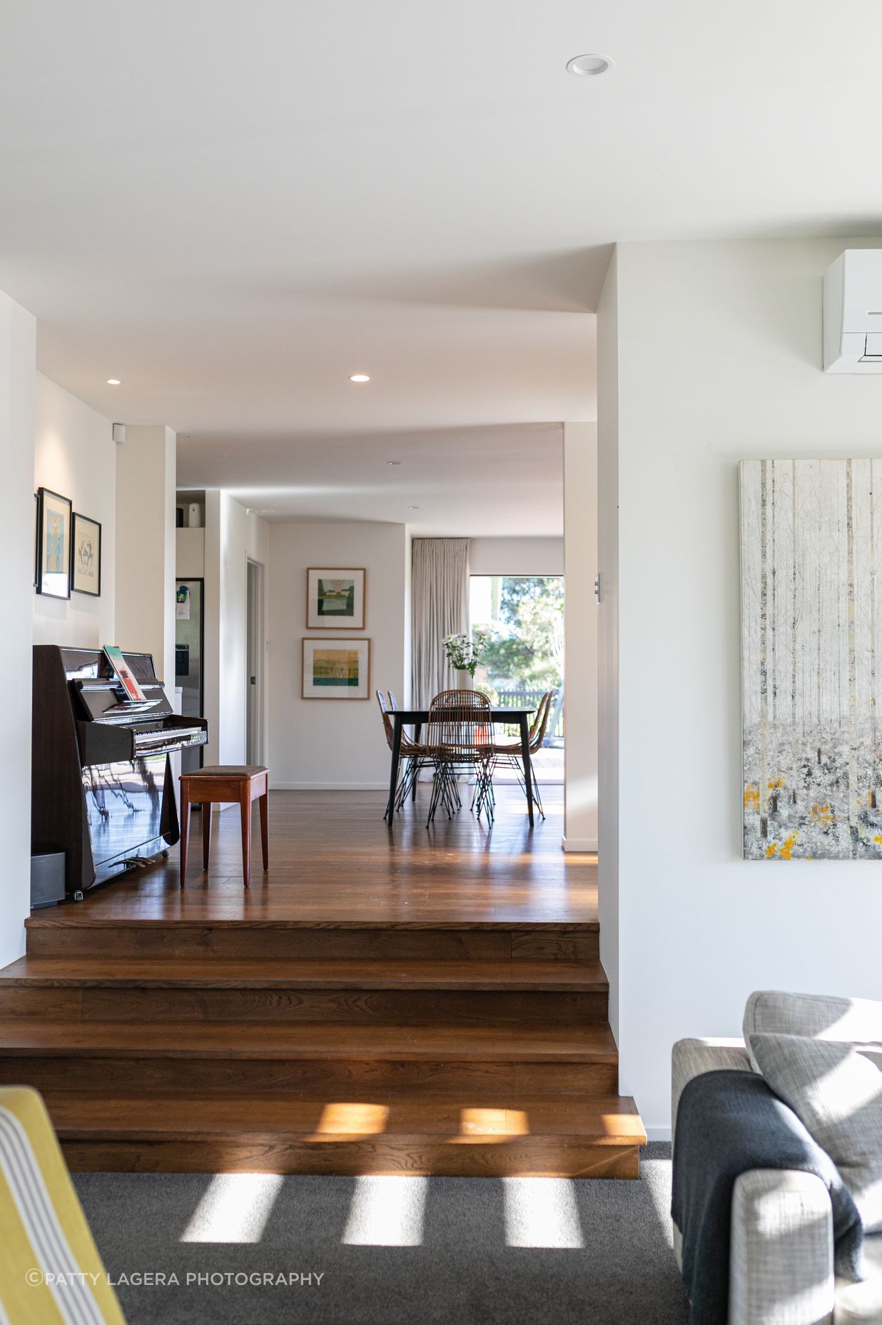 The interior's palette is subdued to feel bright and airy.