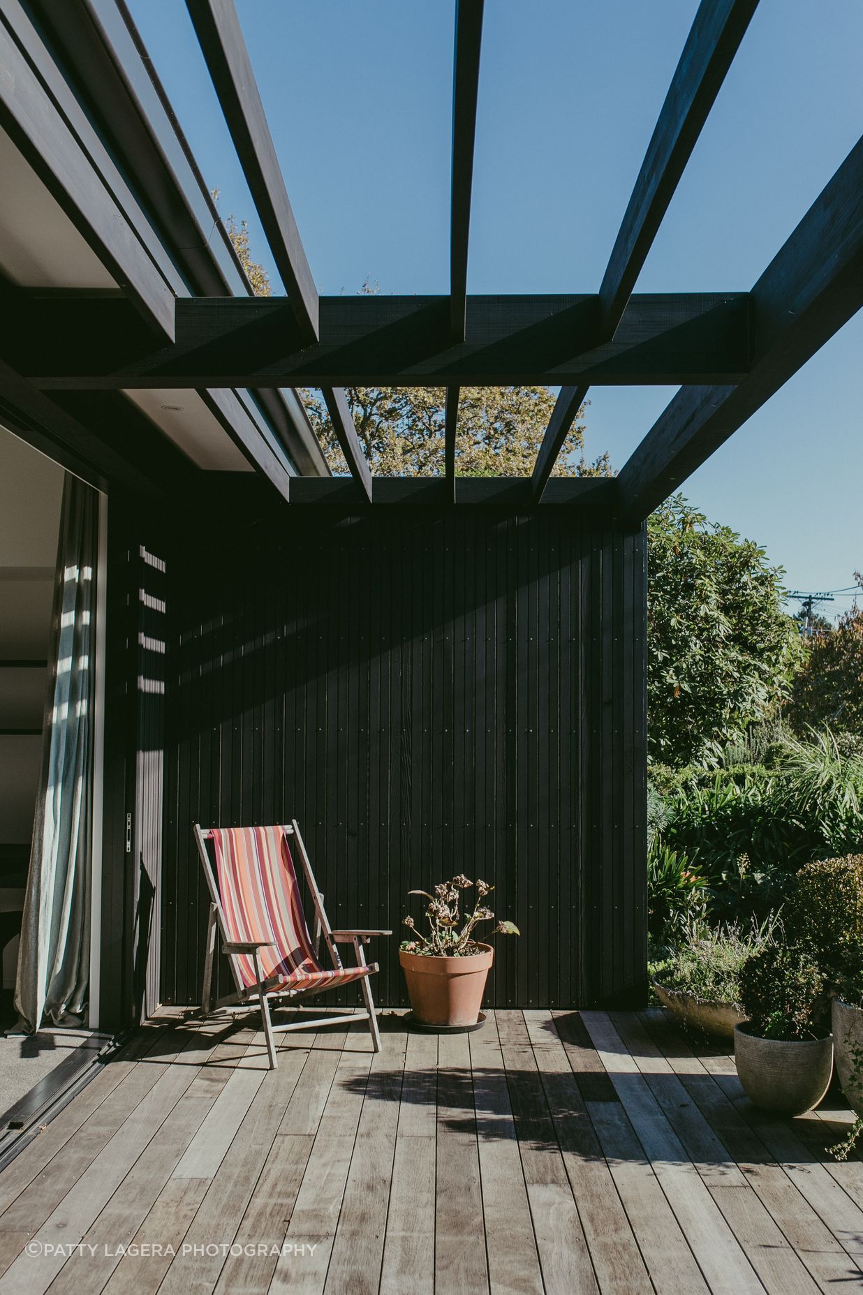 The residents can enjoy sitting out on the sun-drenched decks around the home.