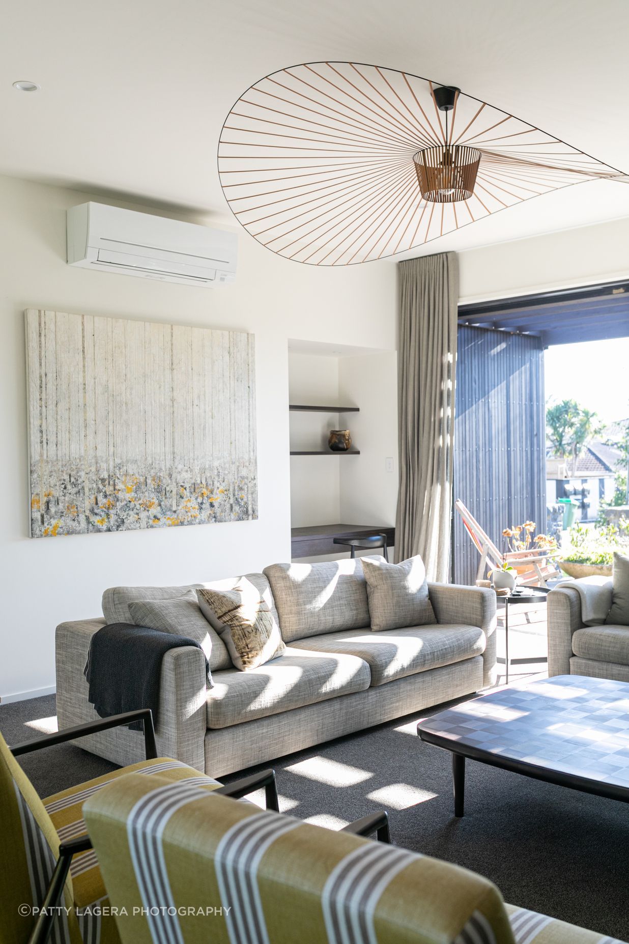 A separate sitting area includes a built-in study nook.