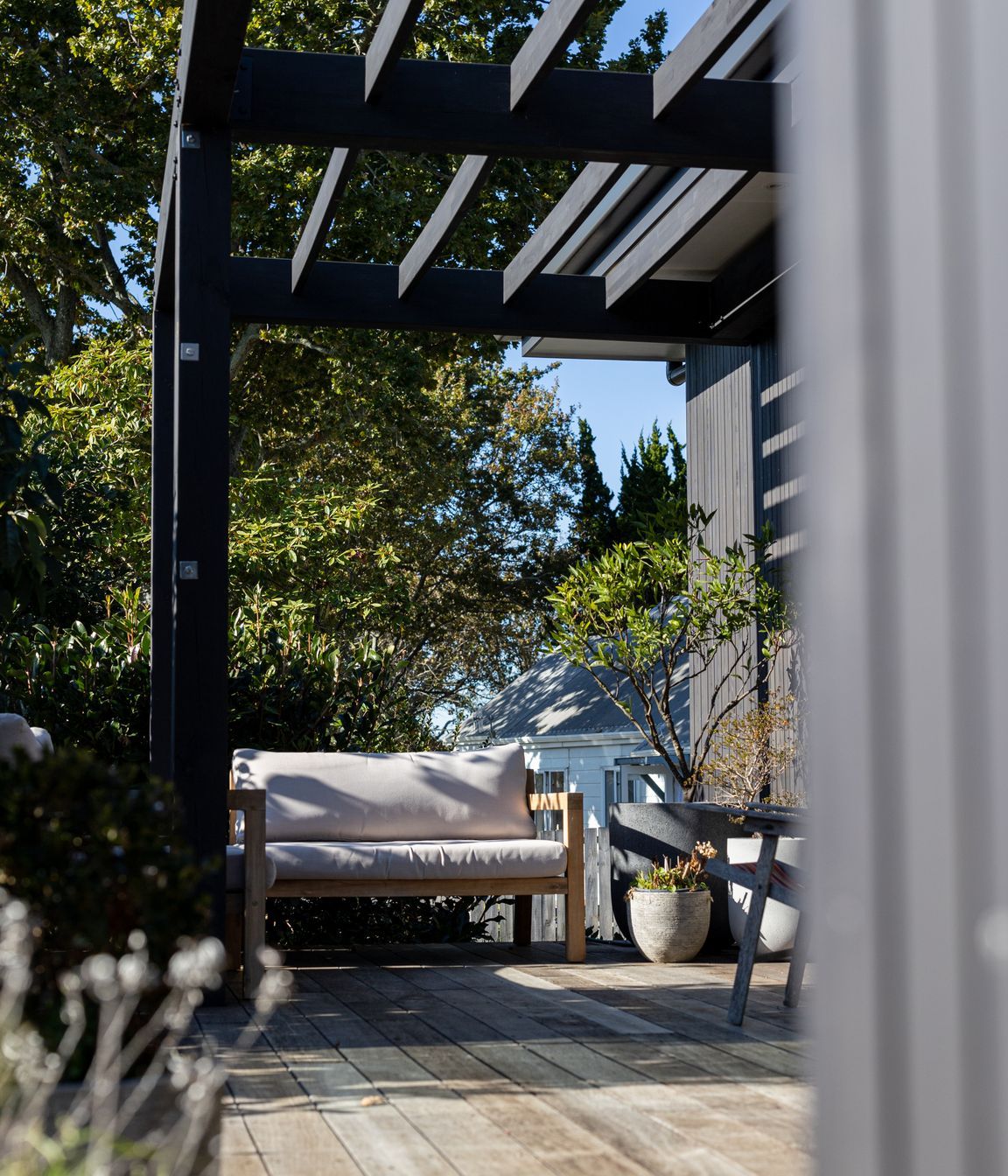 The property's existing landscaping was considered during the works.